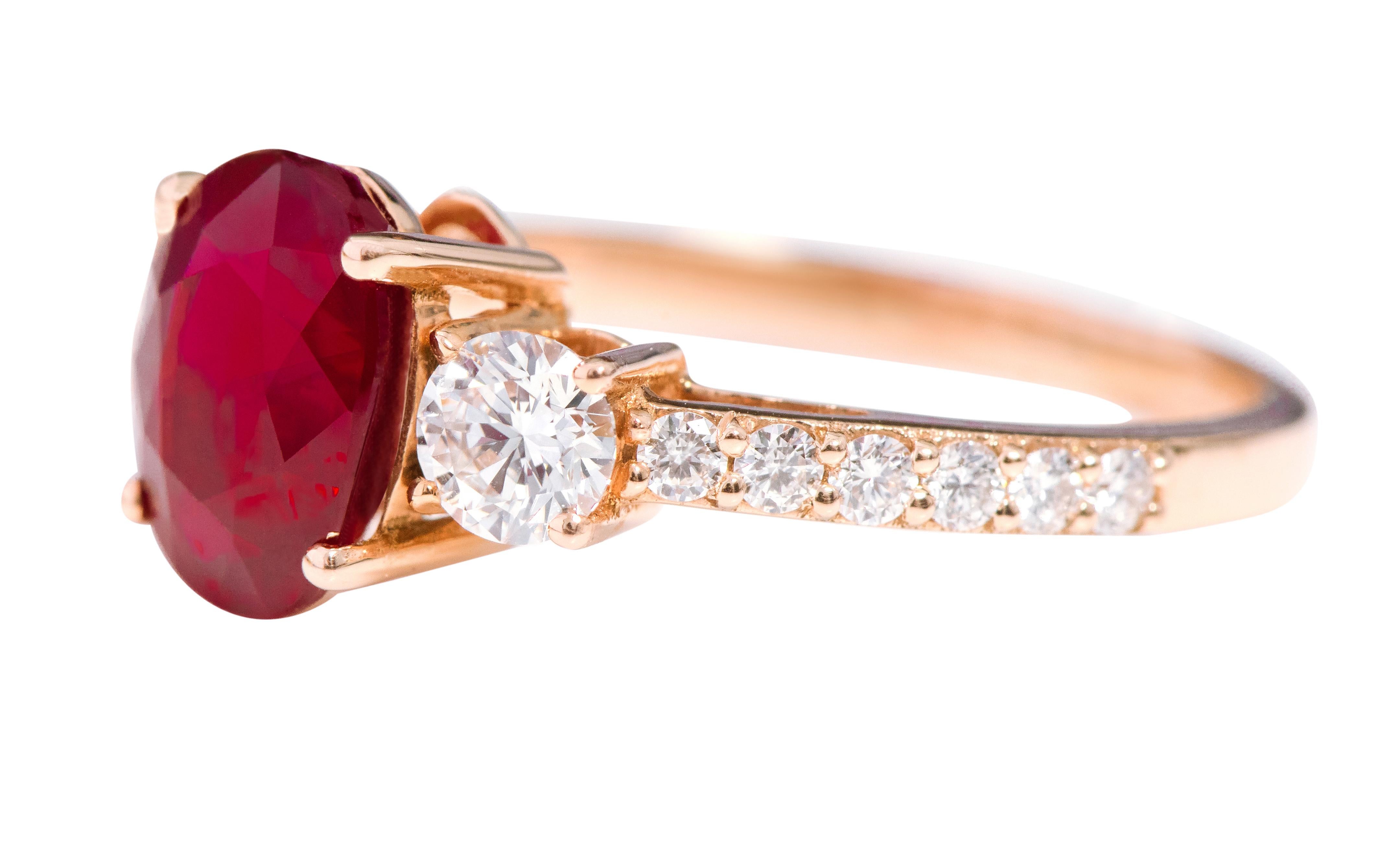 18 Karat Rose Gold 2.47 Carat Oval-Cut Ruby and Diamond Three-Stone Ring

This magnificent blood-red ruby and diamond trinity ring is impressive. The three-stone trinity ring tells a story by not only representing the said “past, present, and