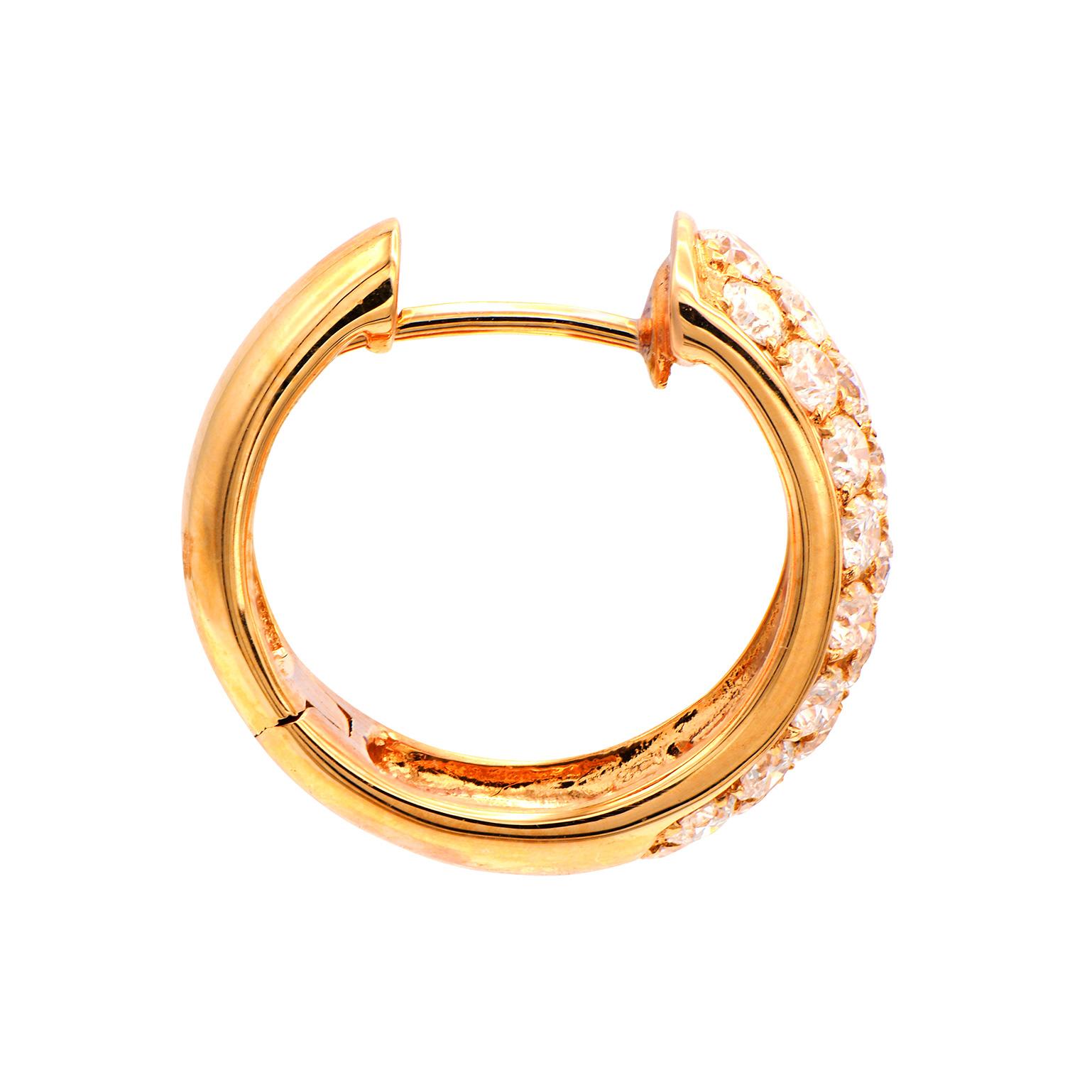 These beautiful hoop earrings are made of 4.9 grams for 18 karat rose gold. Each one has 3 rows of stunning VS2, G color diamonds. The total diamond weight is 1.47 carats which is made up of 50 round diamonds. These earrings are securely closed with