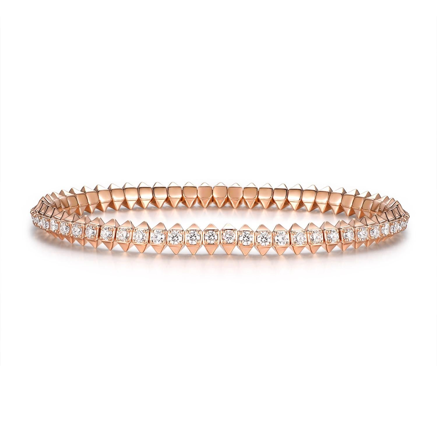 The 18 Karat Rose Gold 3.83 Carat Stretch Bangle is a stunning piece of jewelry that showcases the iconic clash motif design. Crafted in luxurious 18 karat rose gold, this bangle features a captivating combination of studded and polished