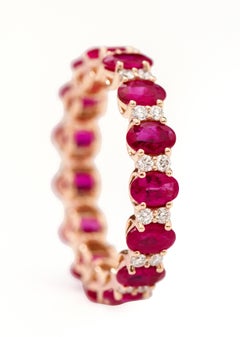 18 Karat Rose Gold 4.00 Carat Oval-Cut Ruby and Diamond Eternity Band Ring