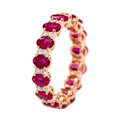18 Karat Rose Gold 4.00 Carat Oval-Cut Ruby and Diamond Eternity Band Ring