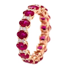 18 Karat Rose Gold 4.00 Carat Oval-Cut Ruby and Diamond Eternity Band Ring