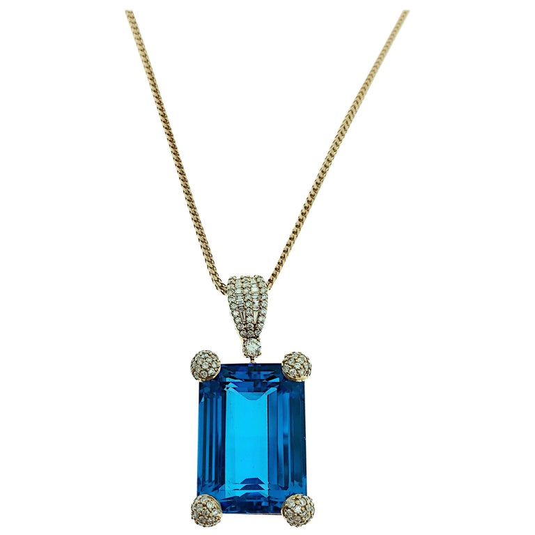 18 Karat Rose Gold 50 Carat Blue Topaz With White Diamonds Pendant 18 Karat Rose Gold 50 Carat Blue Topaz With White Diamonds Pendant Necklace For