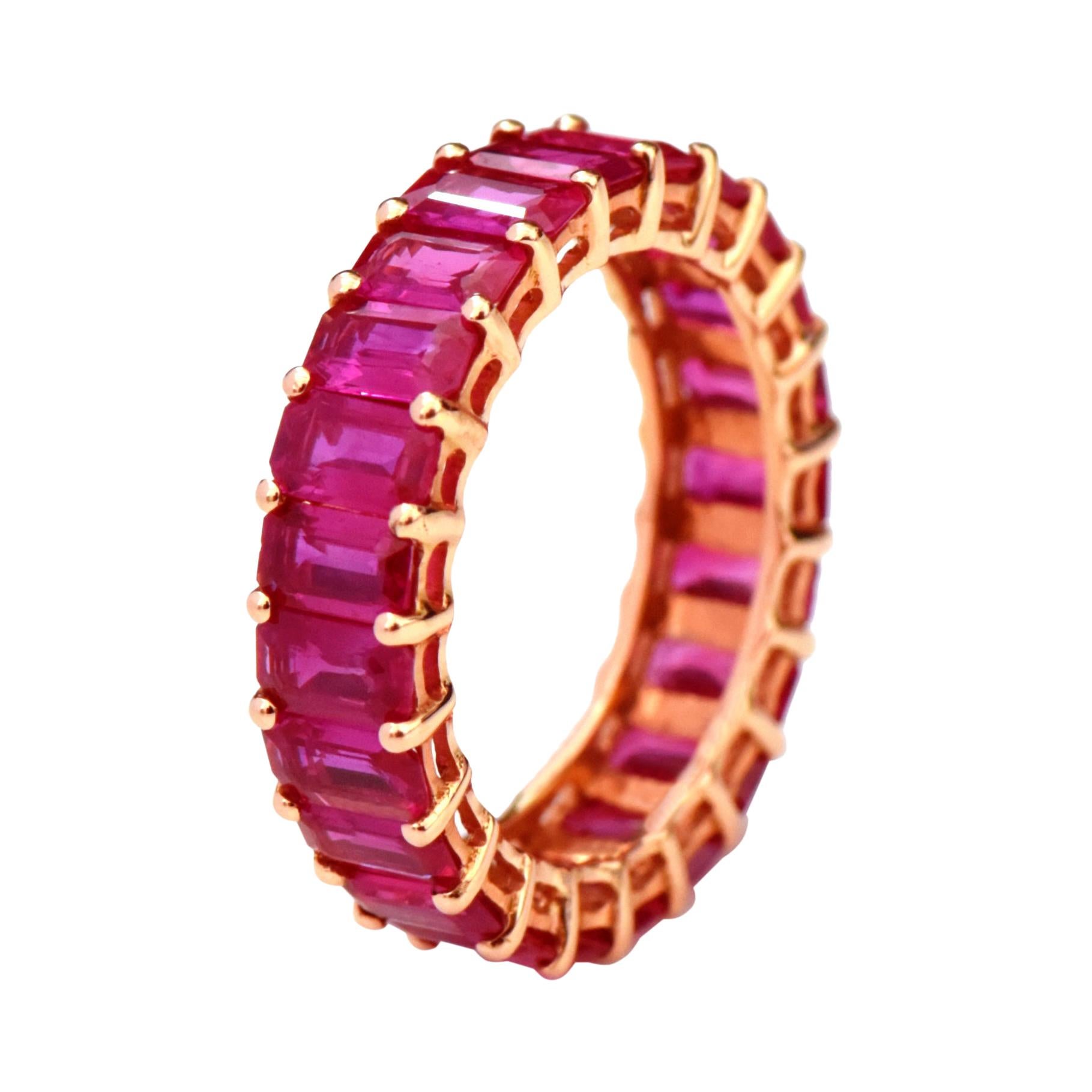 18 Karat Rose Gold 5.63 Carat Ruby Emerald-Cut Full Band Ring For Sale