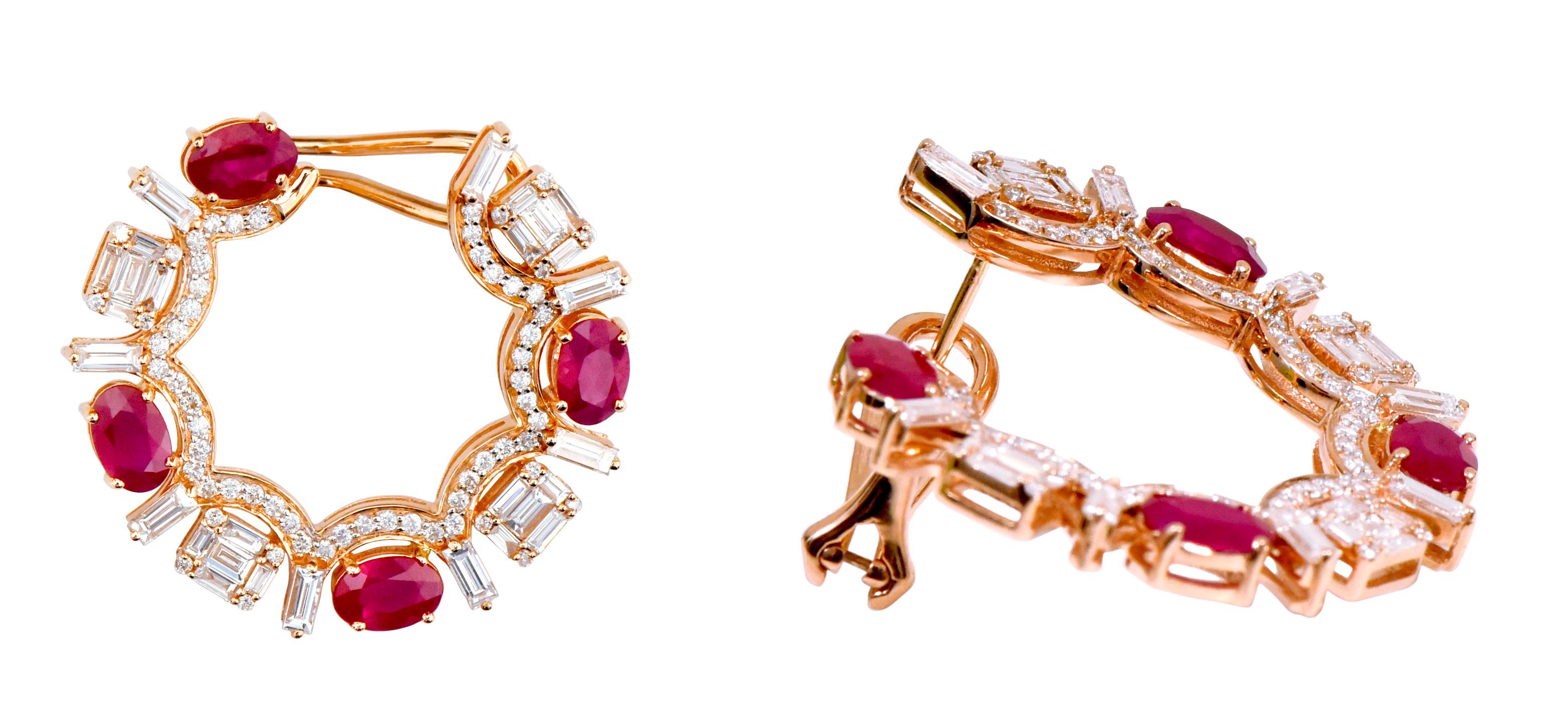 18 Karat Rose Gold 6.38 Carat Ruby and Diamond Modified Hoop Earrings

This exceptional vivid red ruby and invisible set emerald cut diamond modern hoop earring is impressive. The beautiful roundish-octagonal shape of the hoop earring formed with an