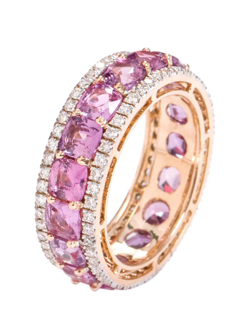 18 Karat Rose Gold 6.82 Carat Pink Sapphire and Diamond Eternity Band Ring

This sensational rose vivid pink sapphire and diamond band is exquisite. The solitaire horizontally placed perfect cushion shape pink sapphires in a shared grain prong