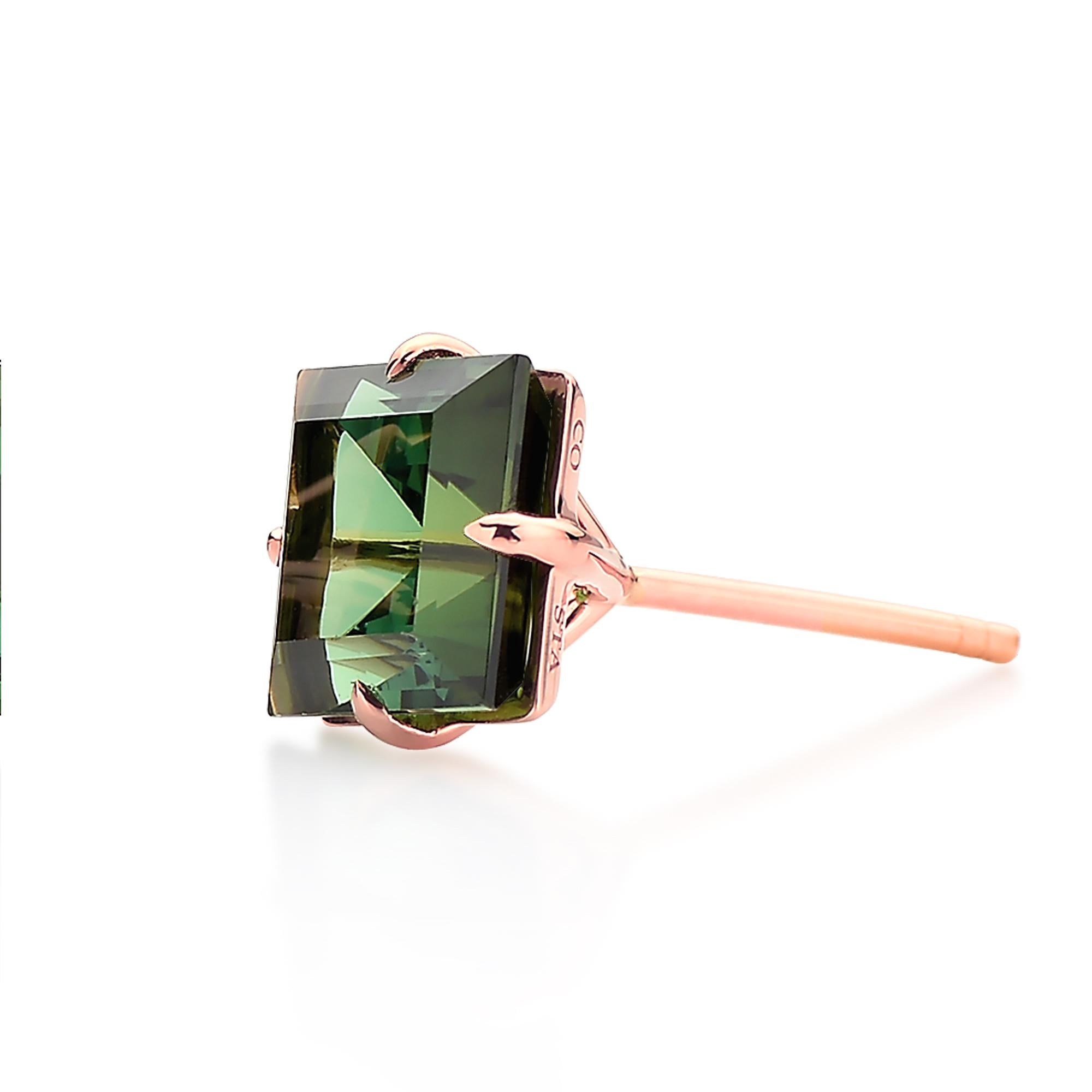 One of a kind emerald cut 6.84 carat green tourmaline studs set in 18kt rose gold.

Sparkling, bright and lightweight, this pair of 18kt rose gold studs are meant for everyday use as an unexpected alternative to a classic pair of diamond studs.

The