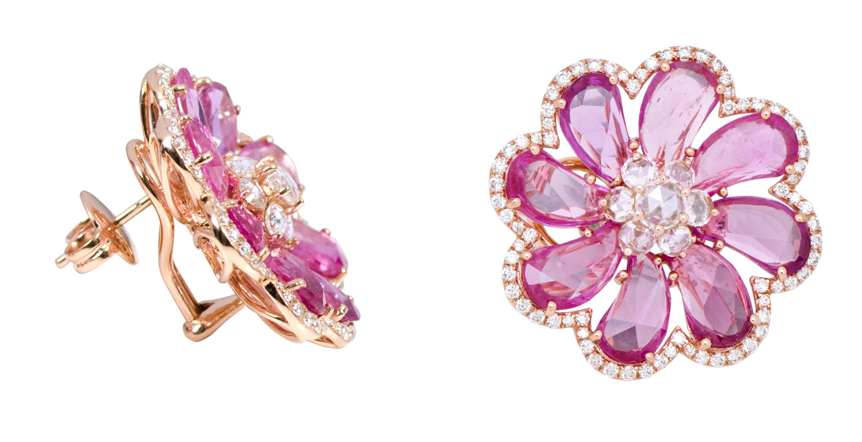 18 Karat Rose Gold 7.24 Carats Pink Sapphire and Diamond Flower Stud Earrings

This set of stud earrings is as gorgeous and refreshing as a beautiful flower that blooms graciously in spring. This brilliant blue sapphire and diamond set of stud