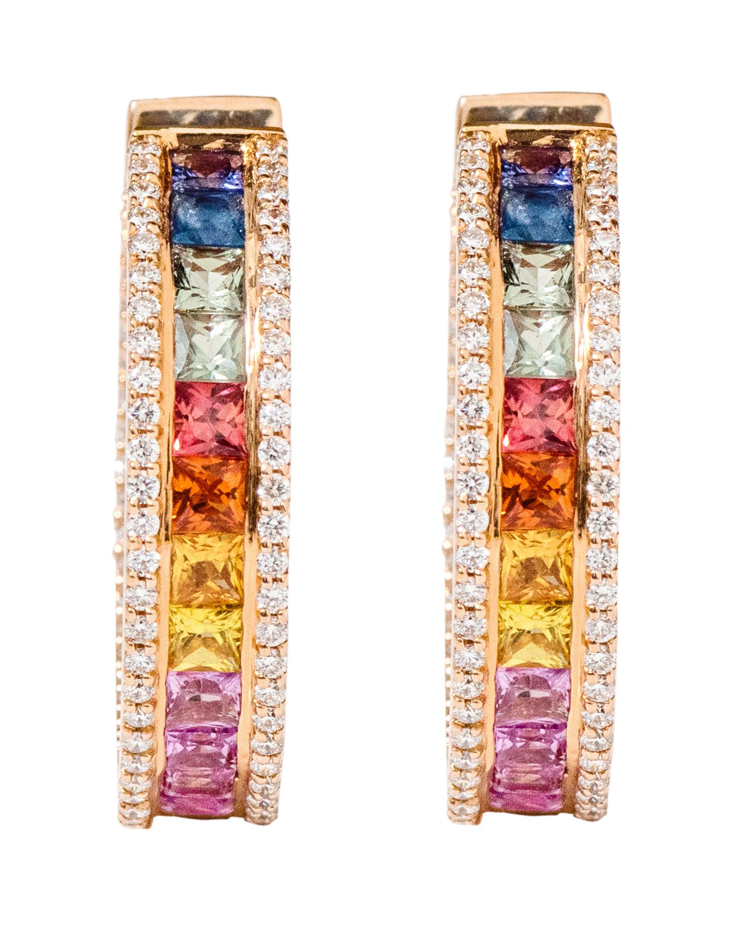 18 Karat Rose Gold 9.33 Carat Multi-Color Sapphire and Diamond Hoop Earrings 

The enchanting rainbow multi-sapphire and diamond full hoop are gratifying. The solitaire identical size princess cut multi-sapphires in channel setting enclosed within