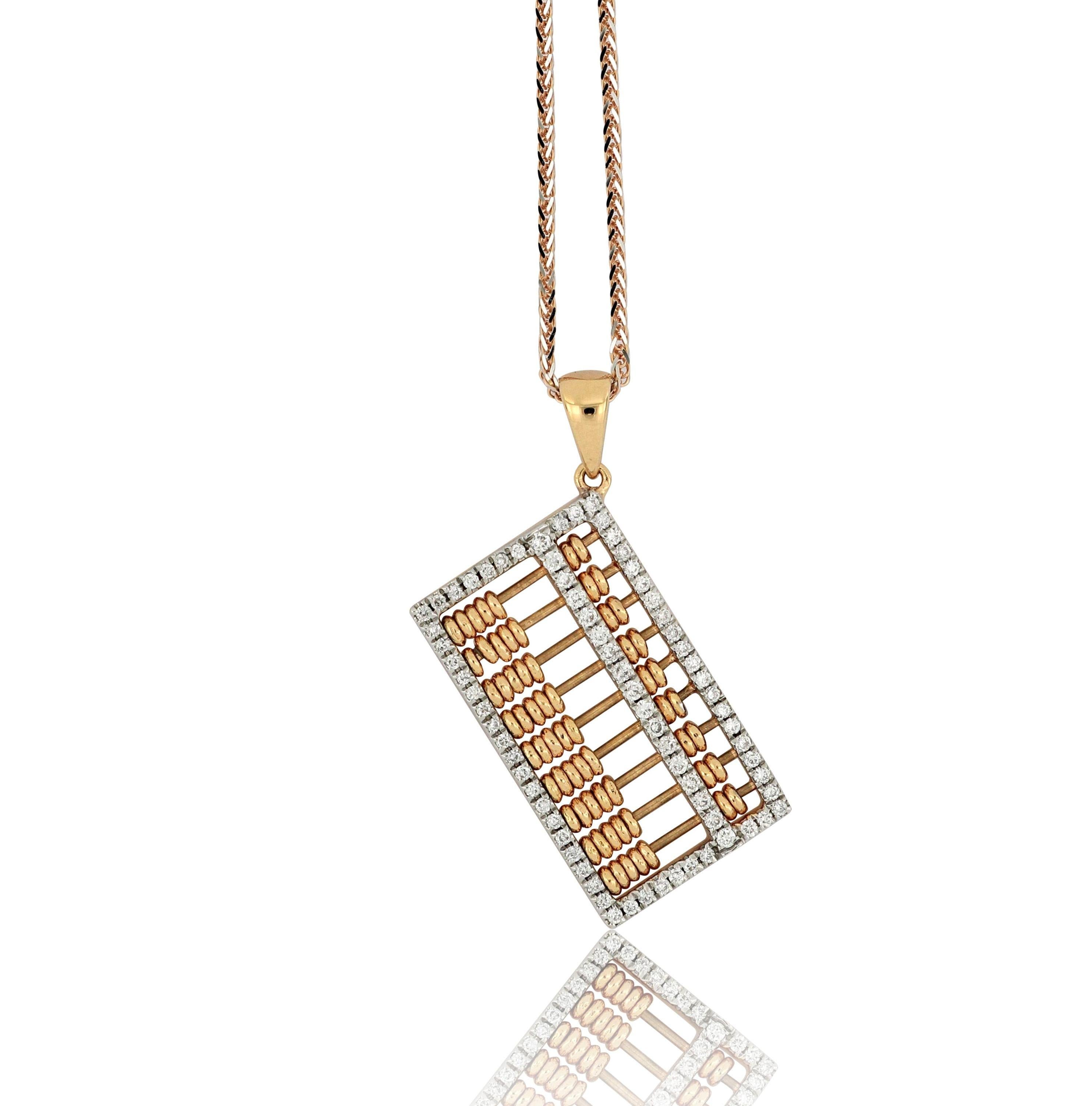 Abacus pendant with moving beads, set with diamonds  surround frame weighing 0.26 carats, mounted in 18 Karat rose gold.
Abacus, invented in ancient China  more than 2,600 years ago, is a traditional computing tool for businesses and widely used in