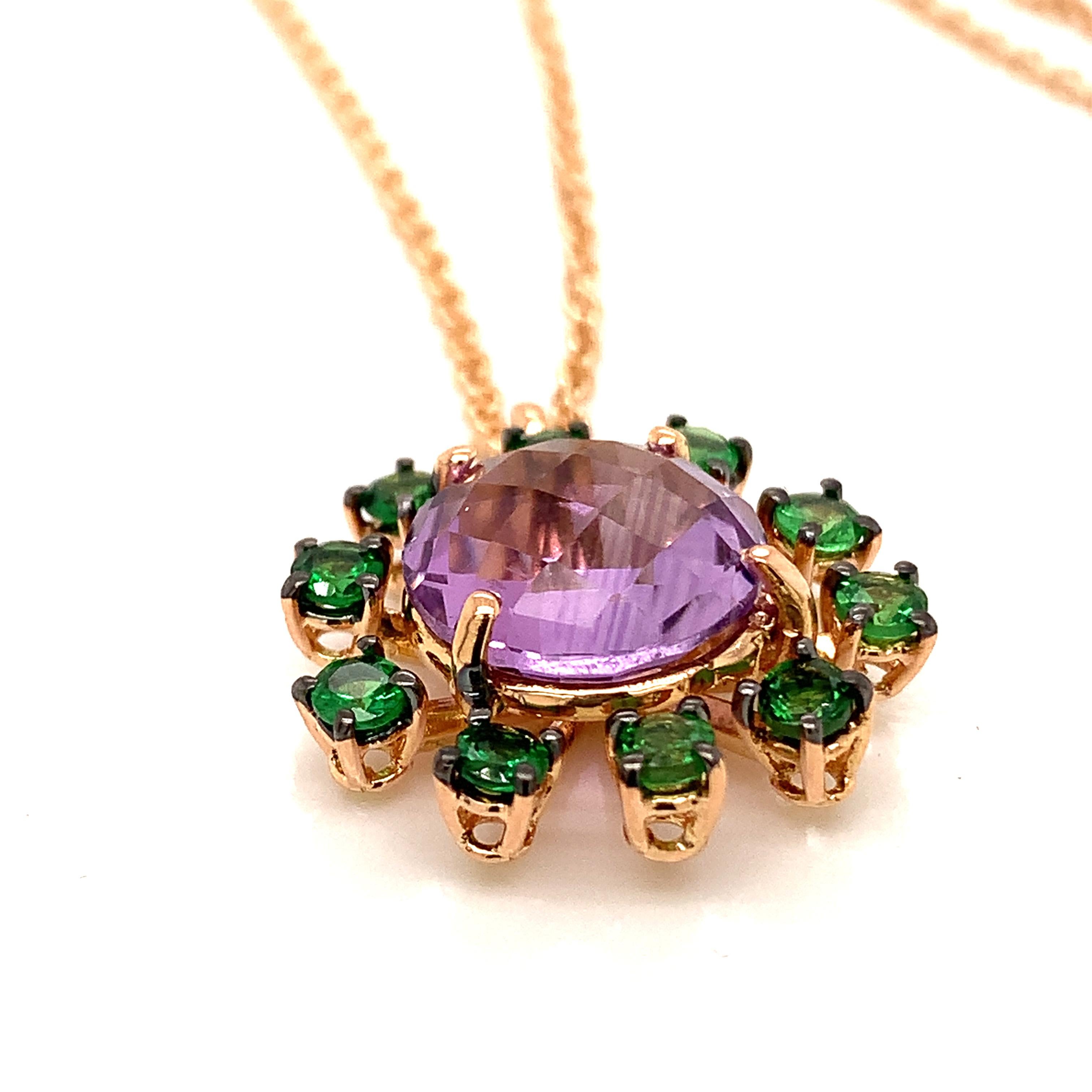 Garavelli pendant with chain , in rose gold 18 kt with Amethyst and Tzavorite - made in Italy
 The total chain lenght is 44 cm / inches 17  with a loop at 40 cm /15.5 inches
18kt GOLD grs : 6.30
Round multifaceted natural amethyst ct 3.10 diameter