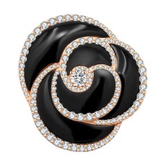 Bague en or rose 18 carats, onyx noir et diamants