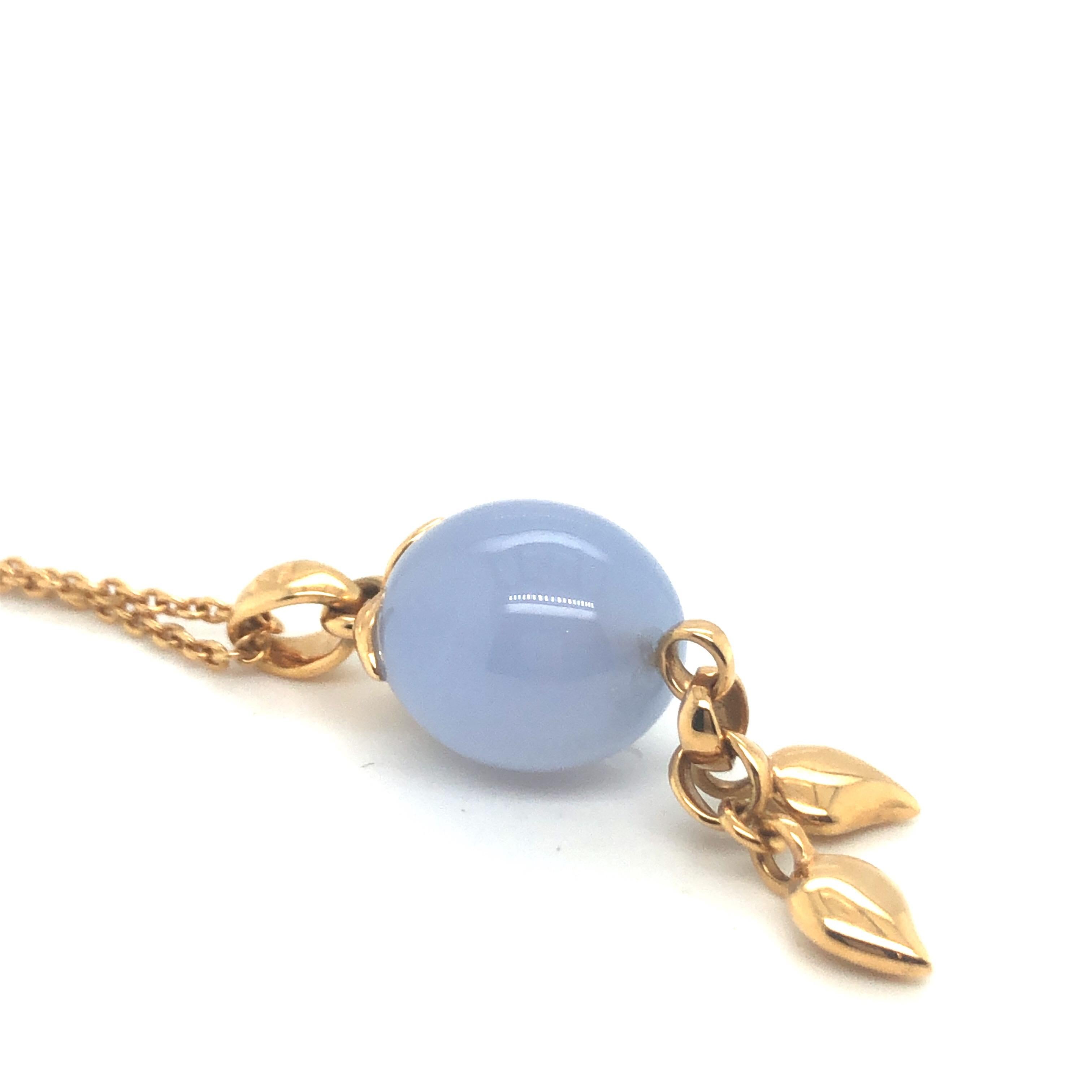 Casual chic 18 karat rose gold and chalcedony Coconut pendant necklace by German jewelry brand Tamara Comolli. 
Tamara Comolli's Coconut pendant is set in 18 karat rose gold and features a beautiful olive-shaped blue Chalcedony and two drop-shaped