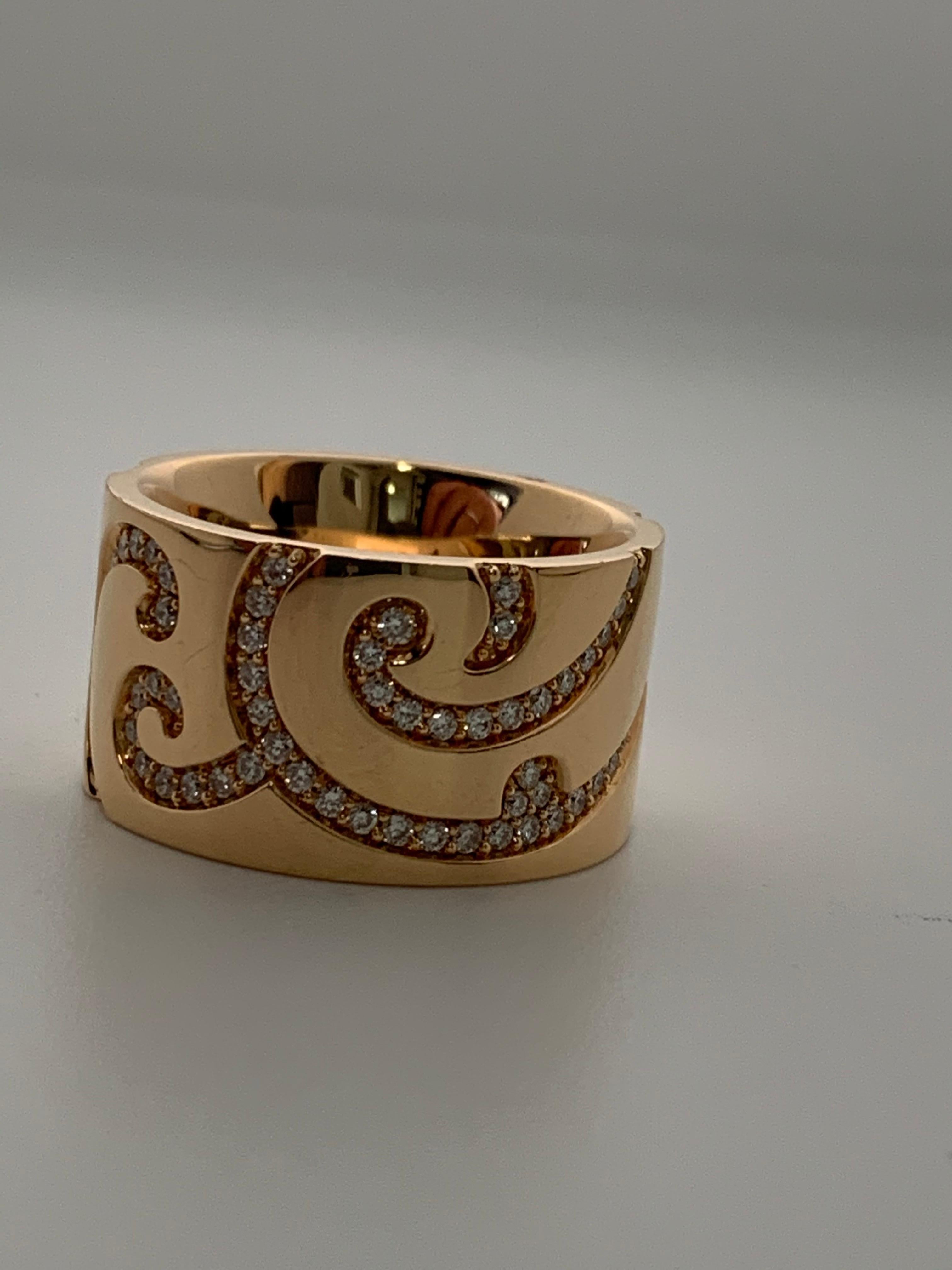 Wide Cigar Band with a whimsical and elegant feel. Solid 18 Karat Gold for a nice and strong feel on the finger. Goes very well paired with a Rose Gold watch or accented Rose Gold Watch. Will definitely become a very often used piece as it can go