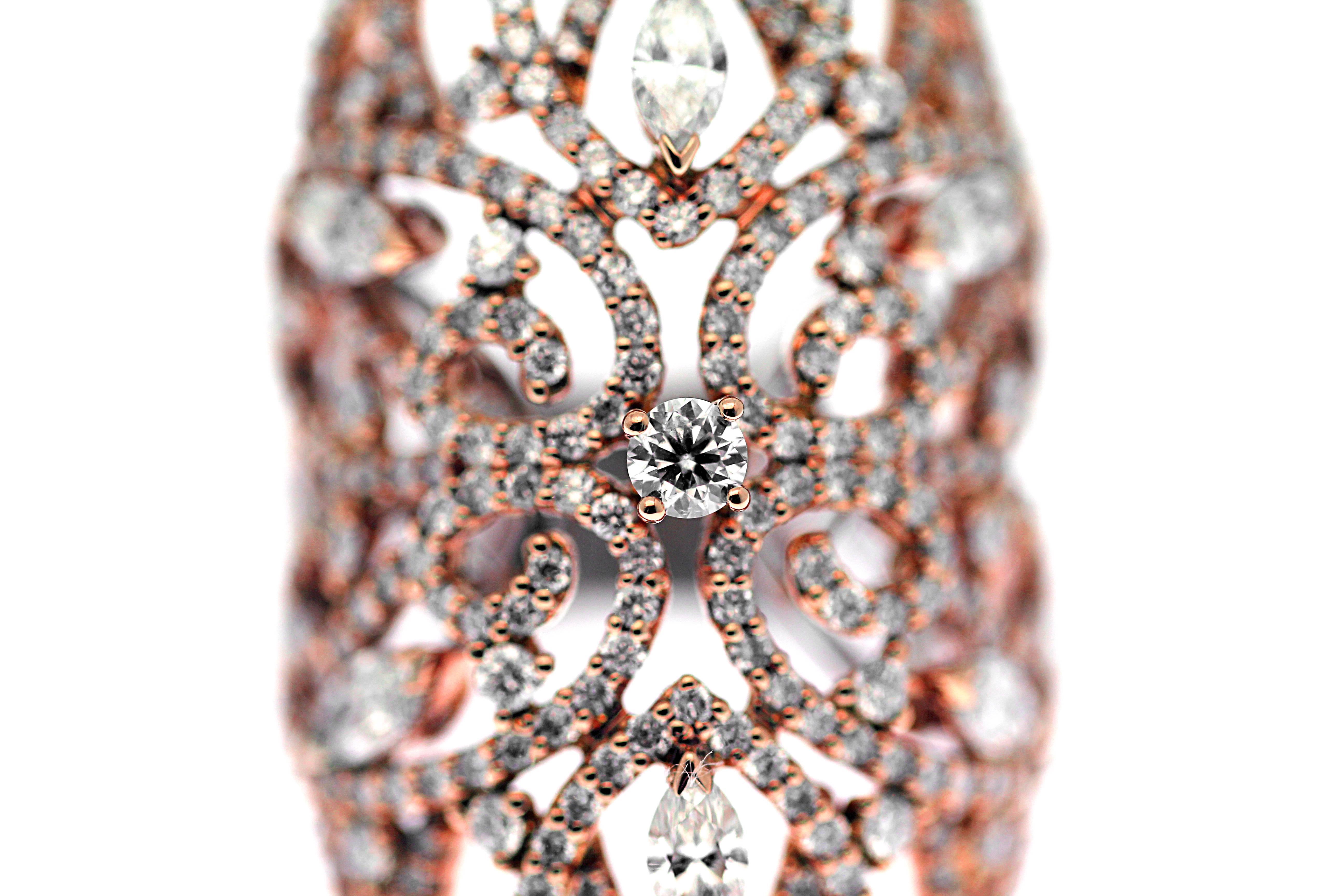 Exquisite 18kt rose gold lace ring.
Set with 3.50ct of pure white brilliant and marquise cut diamonds to add an extra fancy touch.
Very comfortable to wear,  as the back is specially crafted to not be thick and heavy.