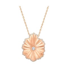 Colgante de oro rosa de 18 quilates y diamantes