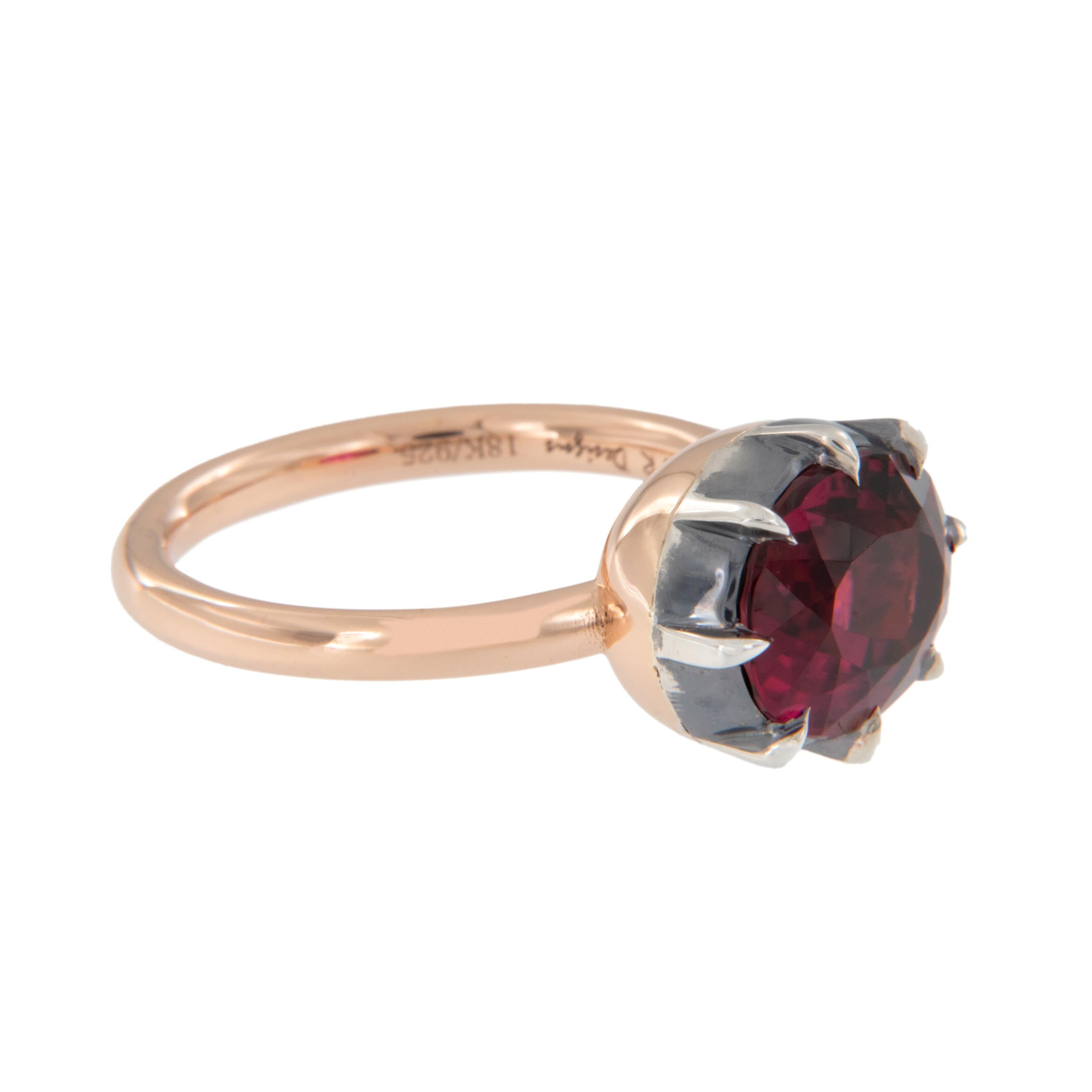 Handmade in NYC & known for his superb, finest quality gems & craftsmanship, this unique ring by William Rosenberg is a stunner! Meticulously handmade in contrasting 18 karat rose gold with a lively & juicy 3.73 Cttw oval Rubelite taking center