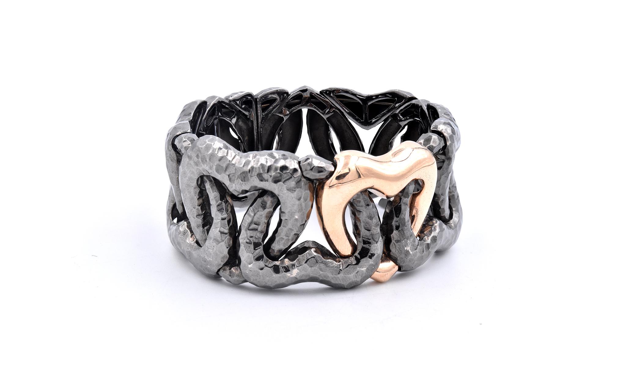 Designer: custom 
Material: 18k rose gold and sterling silver
Dimensions: the bracelet will fit up to a 6.5-8-inch wrist, bracelet measures 28.5mm wide
Weight: 68.18 grams