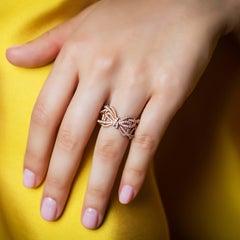 Bague anneau à nœud en or rose 18 carats et diamants blancs