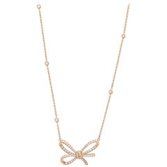 18 Karat Rose Gold and White Diamonds Bow Pendant