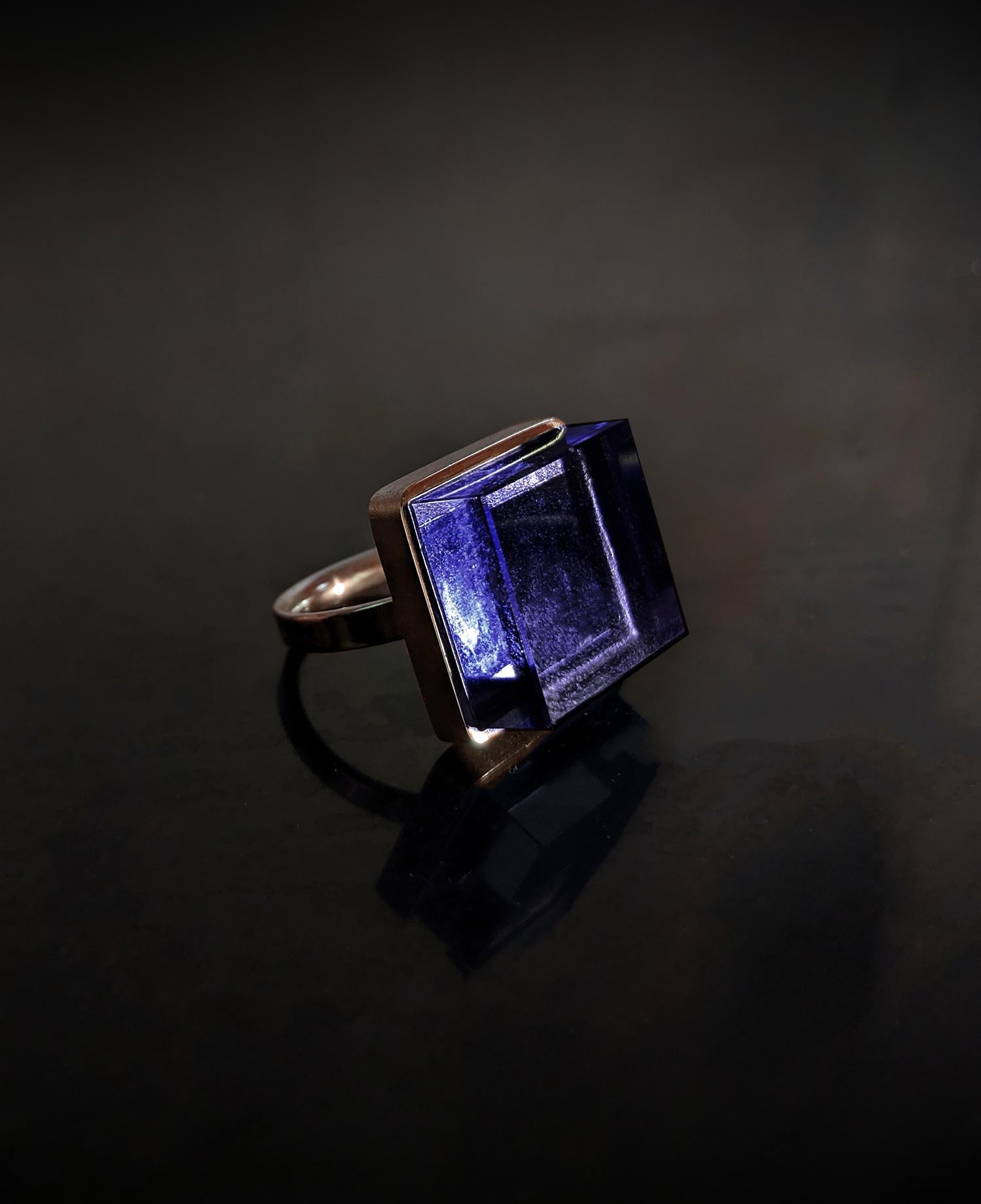 This Art Deco style men ring is in 18 karat rose gold with 15x15x8 mm grown dark vivid amethyst. It was published in Harper's Bazaar and Vogue UA. This piece can be personally signed. It will be packed as a gift. 

The ring reflects the art deco