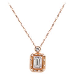 0.58 CT. T.W. Composite Baguette and Round Diamond Frame Pendant Necklace 0.58 CT. T.W. Composite Baguette and Round Diamond Frame Pendant Necklace