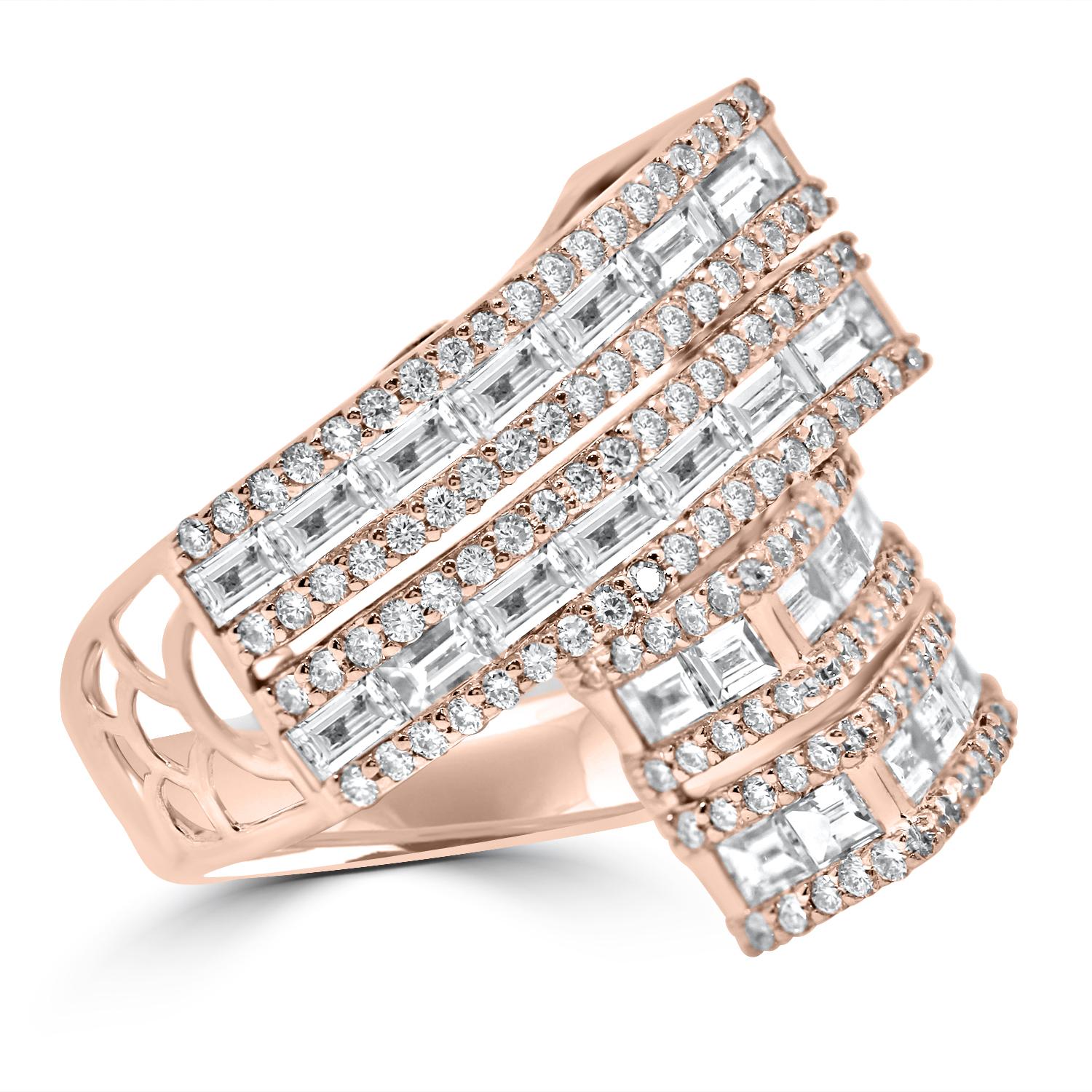 A beautiful 18 Karat Rose Gold ring embedded with Baguette and Brilliant Diamonds with a total weight of 3,13 Carats. The diamonds range between E and F colour and a VVS clarity.
This piece was crafted in Antwerp, Belgium. Made in 2018, this piece