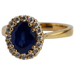 18 Karat Rose Gold Blue Sapphire Diamond Engagement Ring 18 Karat Rose Gold Blue Sapphire Diamond Engagement Ring