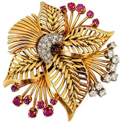 Vintage 18 Karat Rose Gold Brooch with Diamonds and Rubies, circa 1940s