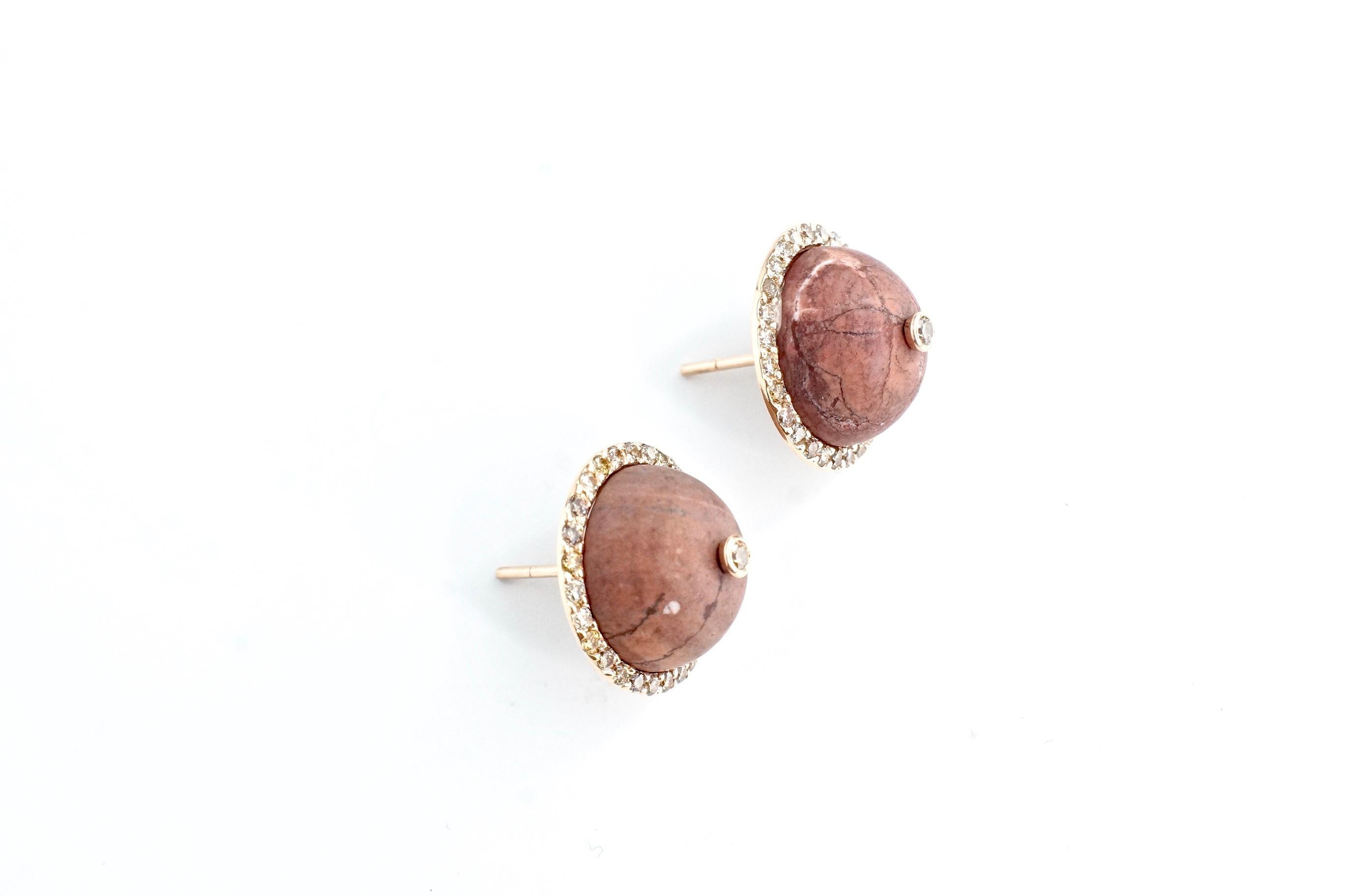 Brown Jasper Martha Studs
A pair of eighteen-karat rose gold earrings consisting of a dome-like brown jasper cabochon surrounded by faceted brown diamonds.  An additional brown diamond is set in the center of the jasper.  
Total Jasper Weight –
