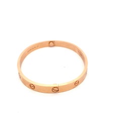 Bracelet Love de Cartier en or rose 18 carats