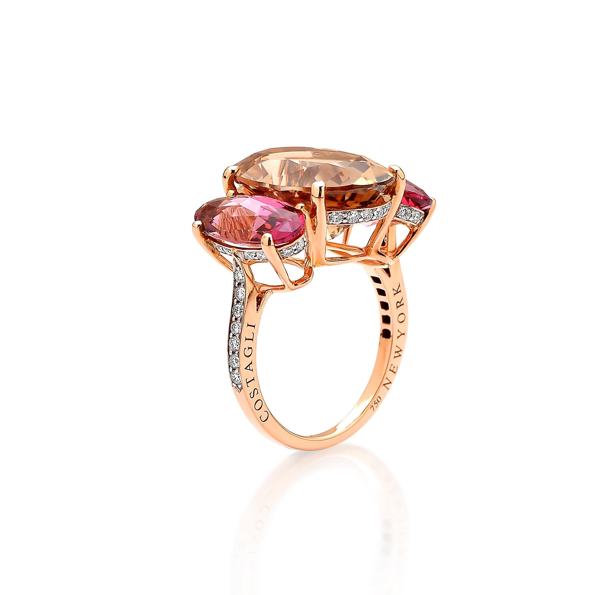 One of a kind oval shape champagne tourmaline ring flanked by long oval shape pink tourmalines set in 18kt rose gold with pave-set round, brilliant diamond detailing.

The warm, rich hues of the champagne and pink tourmaline stones paired with their