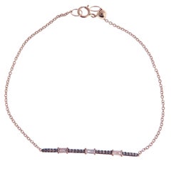 Bracciale a barre in oro rosa 18 carati con pavé di diamanti e accenti di baguette