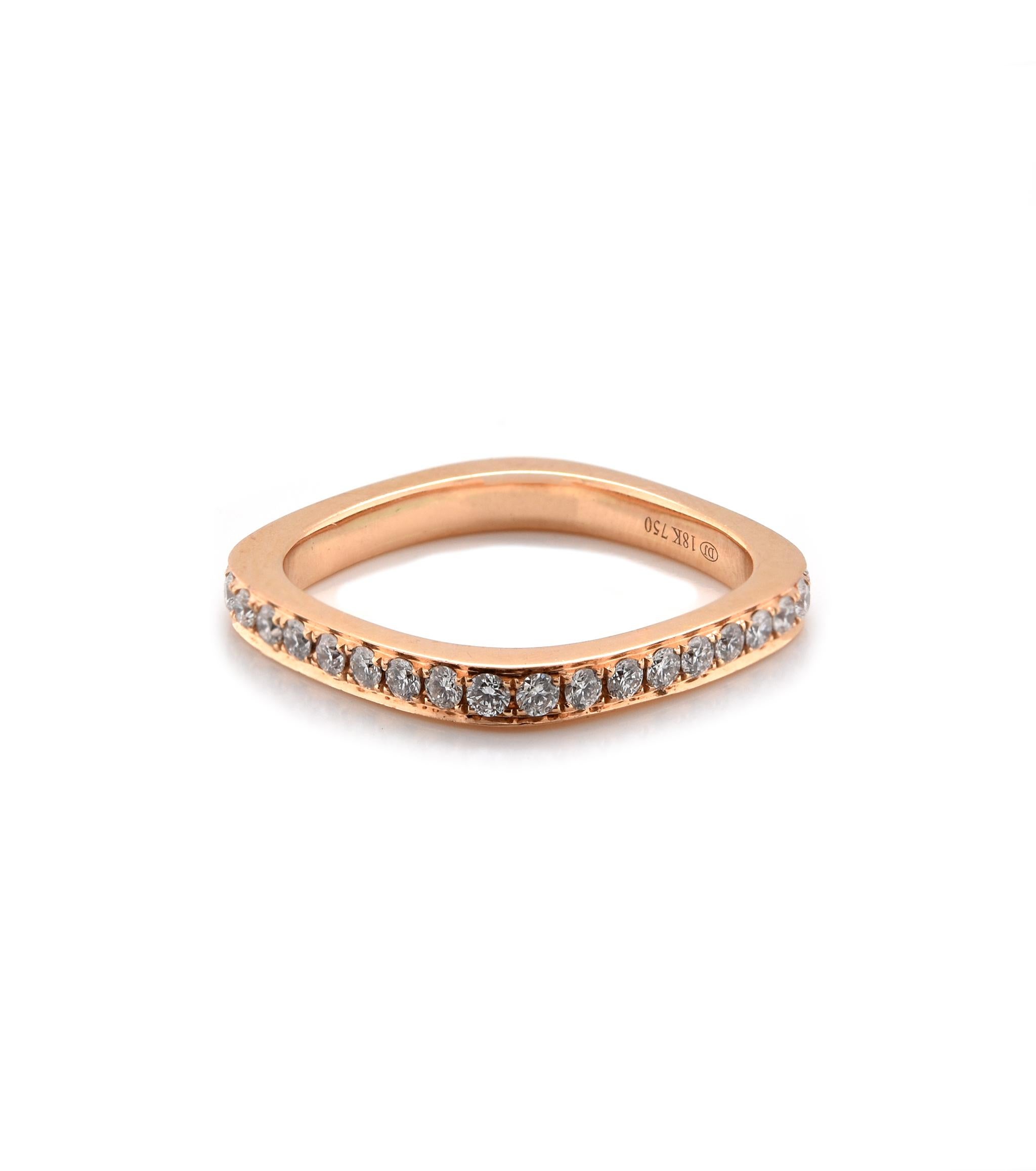 Designer: Custom
Material: 18K rose gold
Diamonds: 36 round cut = .64cttw
Color: G
Clarity: VS2
Size: 7
Dimensions: ring measures 2.7mm in width
Weight: 3.21grams
