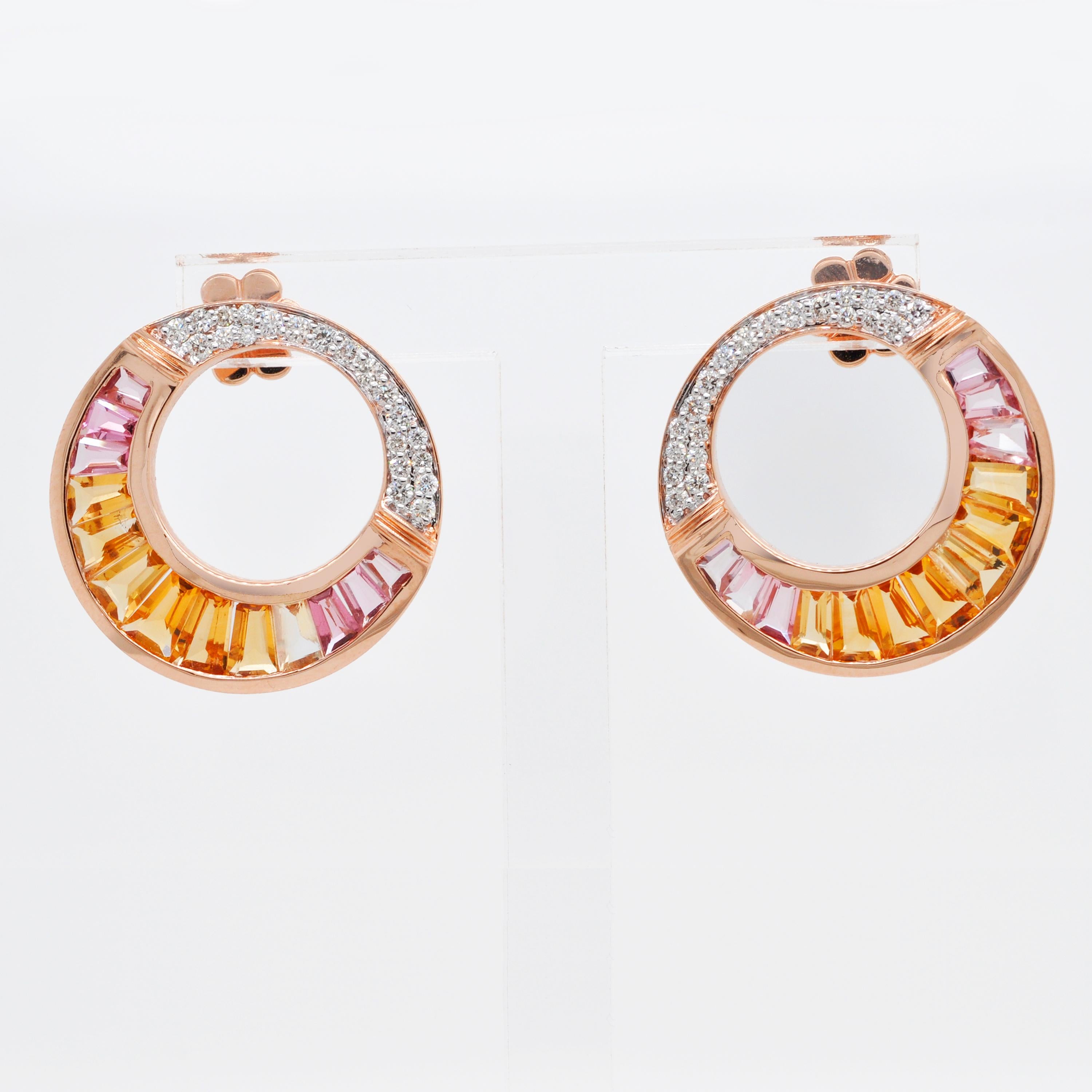 18 karat rose gold citrine peach tourmaline baguette diamond stud earrings.

These 18 karat rose gold citrine peach tourmaline baguette and diamond circular stud earrings are inspired by the jewels worn by Cleopatra in the Egyptian Era, giving it a