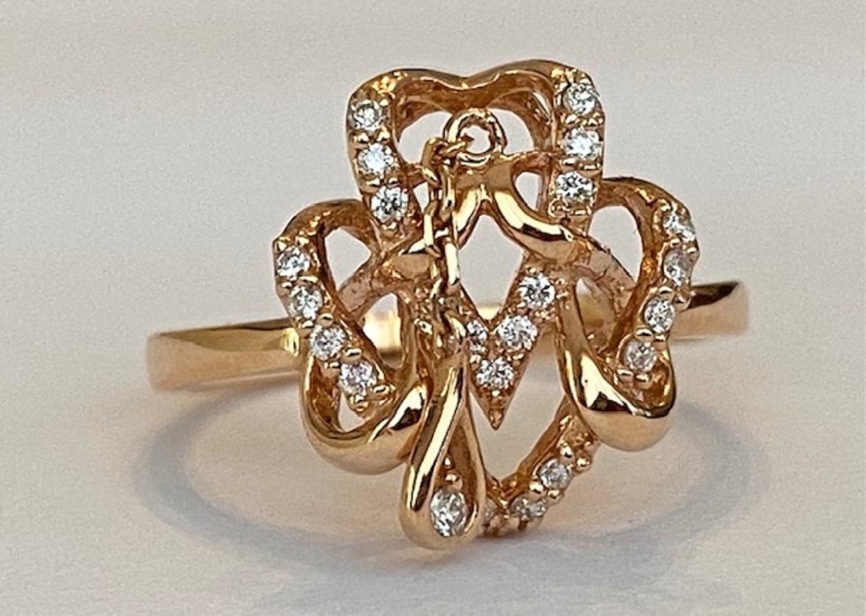 18 karat rose gold entourage ring set with 24 brilliant cut diamonds with a total weight of approx. 0.30 ct H/VS. Quality: 750 (18KT) hallmark stamp
Natural diamonds: approx. 0.30 ct H/VS
Head size: 15mm *13mm
Weight: 3.3 grams
Ring size: 17.25mm 6