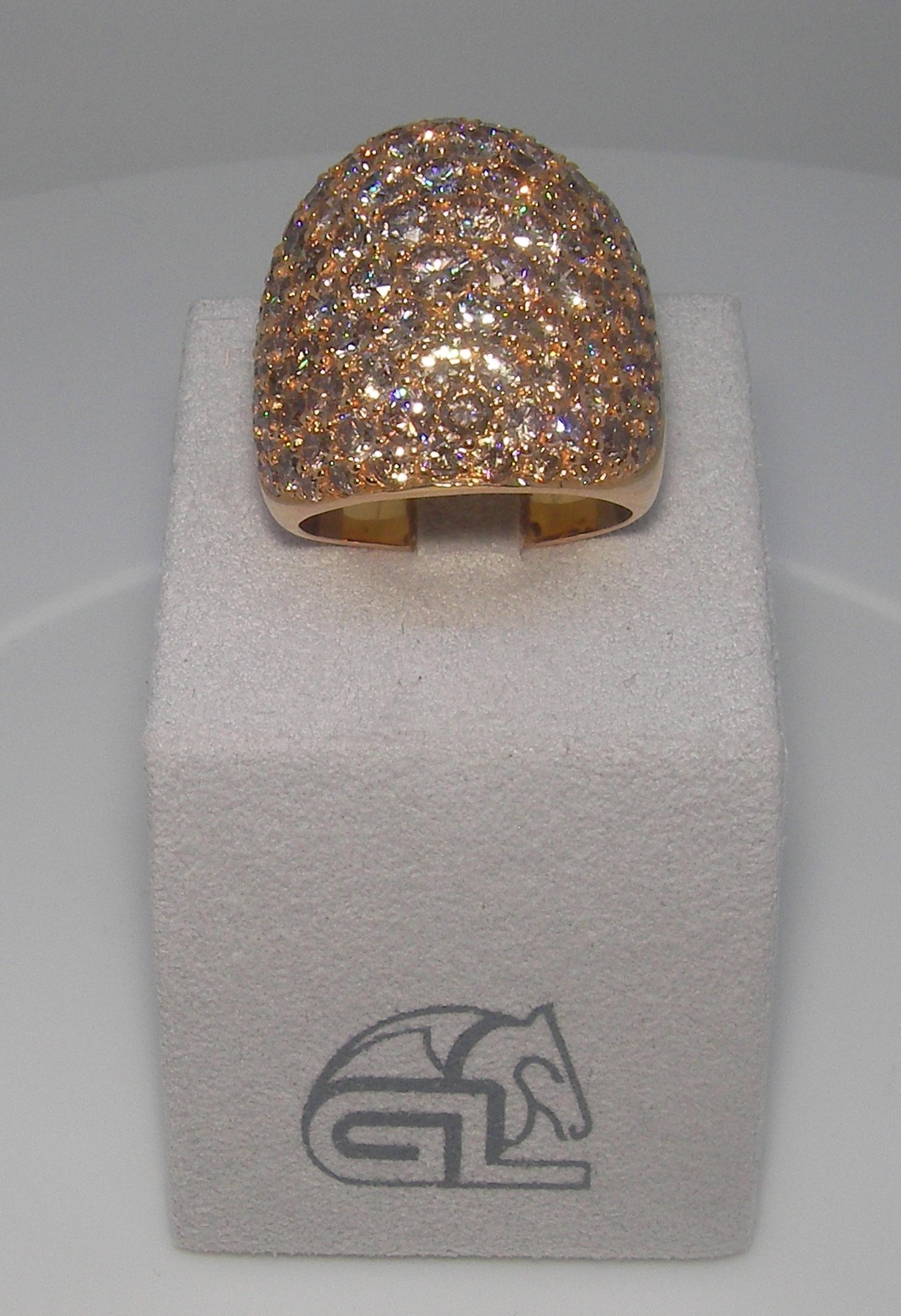 18 Karat Rose Gold Cognac Diamond Cocktail Pflasterring 

93 Cognac Diamonds 6.75 Carat

Size EU 54 US 7


Founded in 1974, Gianni Lazzaro is a family-owned jewelery company based out of Düsseldorf, Germany.
Although rooted in Germany, Gianni