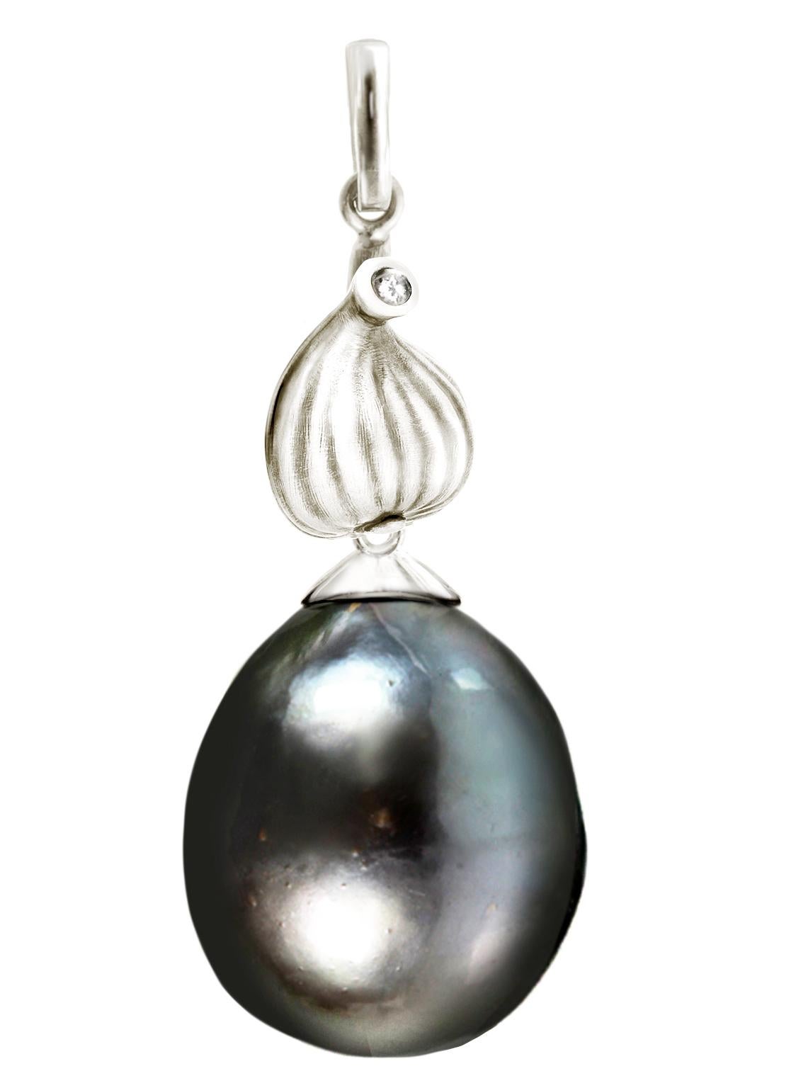 These Fig cocktail earrings are made of 18 karat white gold with detachable 11 mm Tahitian black pearls and two diamonds. The earrings by the artist were featured in Vogue UA review. We use top natural diamonds VS, F-G, we work with german gems