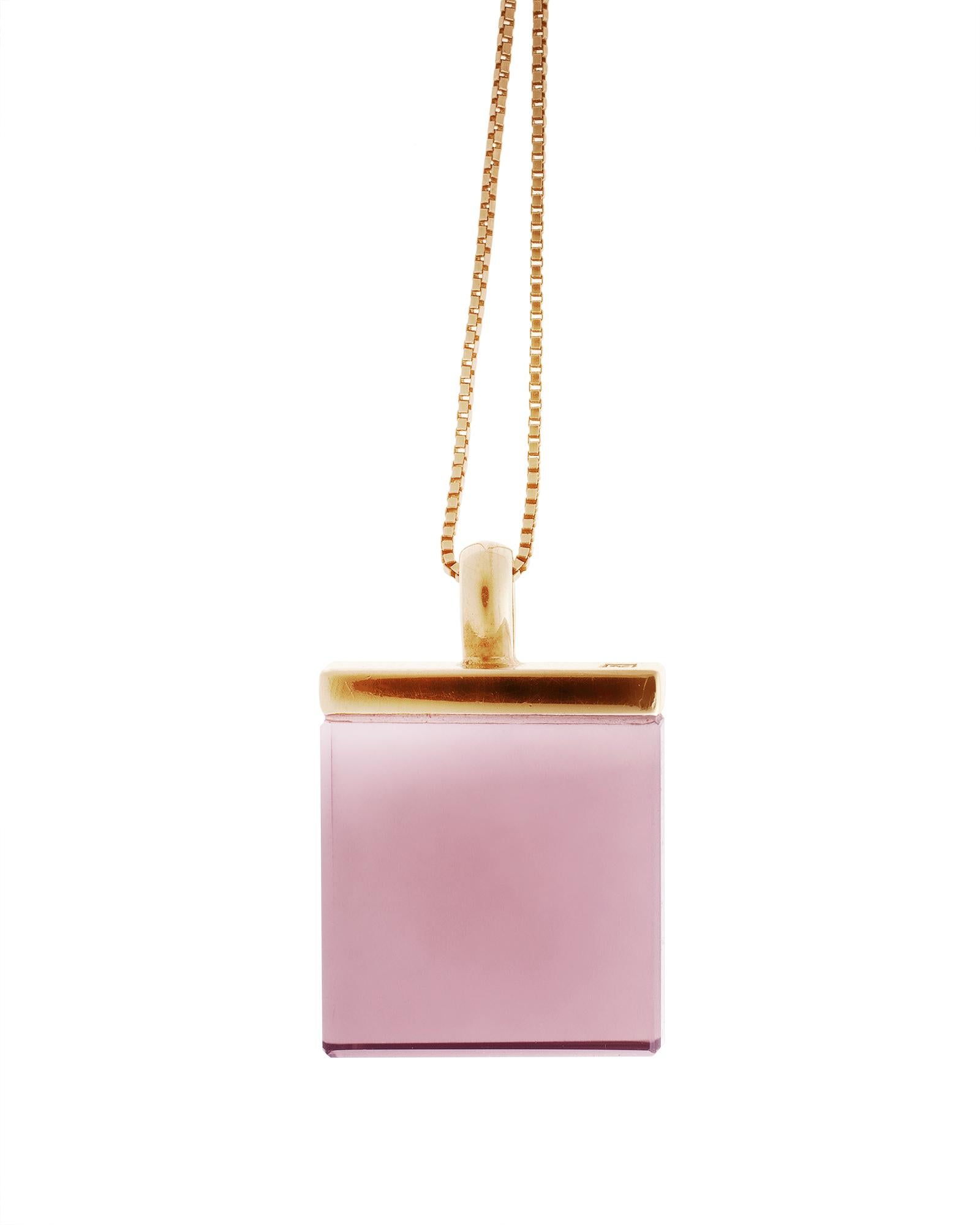 This contemporary pendant necklace is a stunning piece of jewellery crafted in 18 karat rose gold with a 15x15x8 mm natural untreated pink tourmaline. The gemstone was cut specially for the artist by the oldest company in Germany, which has been in