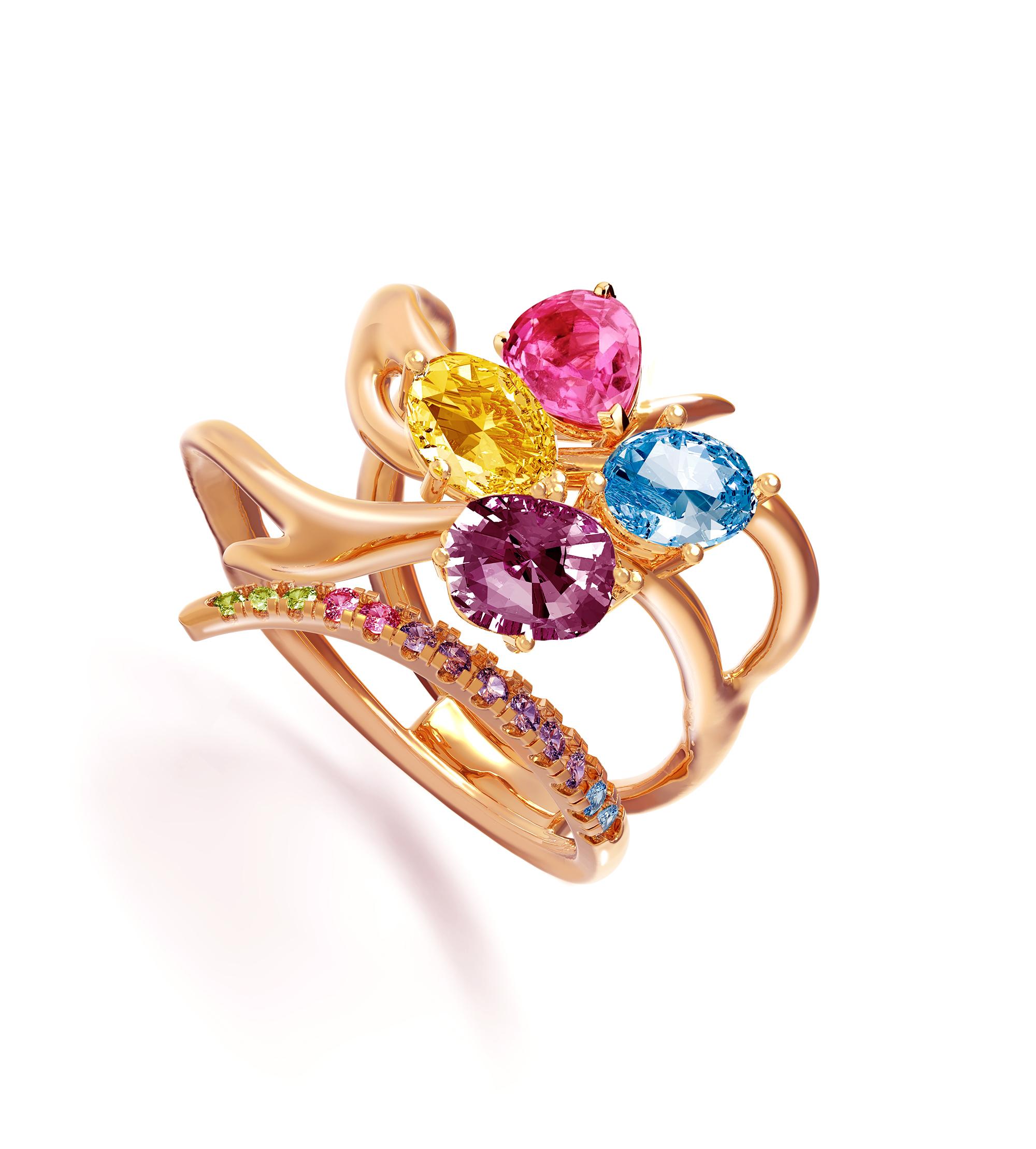 This Anime contemporary ring is made of 18 karat rose gold with your choice of natural gems, custom made to your preferences. The available gems include oval or pear cut pink sapphire, unheated and yellow sapphire in oval cut, blue Swiss topaz and