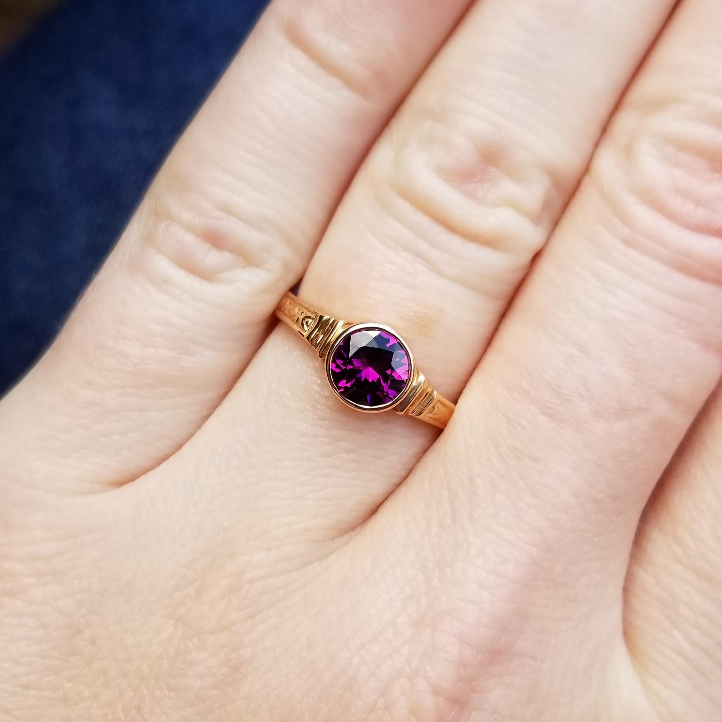 Purple grape garnet is a rare and truly beautiful gemstone. The intense purple flashes and sparkles gorgeously in this well cut gemstone, and because it is a garnet the color is completely natural. This garnet shows a great color shift in different