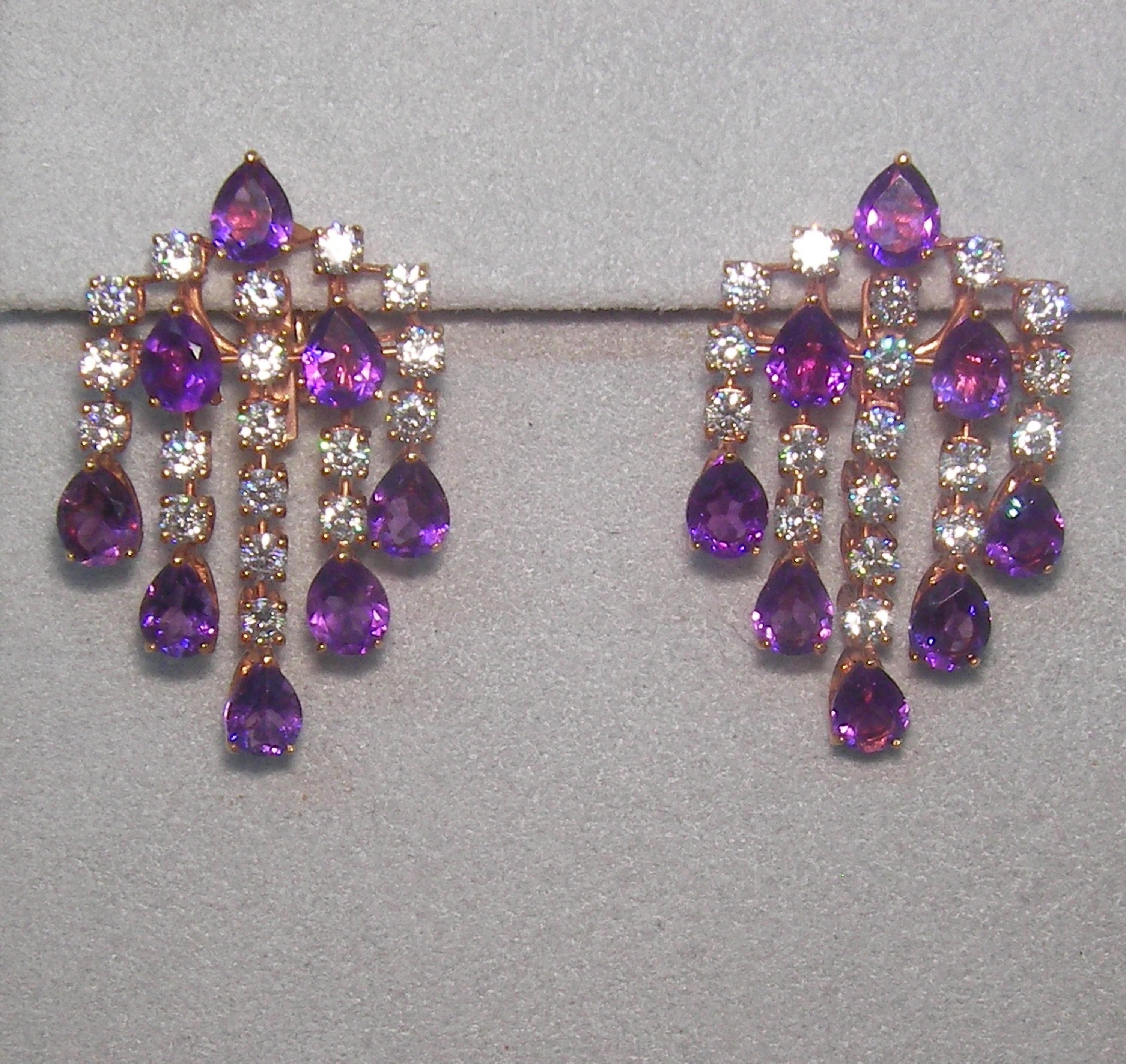 18 Karat Rose Gold Diamond  Amethyst   Dangle Earrings



36 Diamonds 1.90  Carat 
16 Amethyst  4.35 Carat





Founded in 1974, Gianni Lazzaro is a family-owned jewelery company based out of Düsseldorf, Germany.
Although rooted in Germany, Gianni