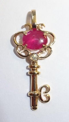 18 Karat Rose Gold Diamond and Ruby Pendant Necklase