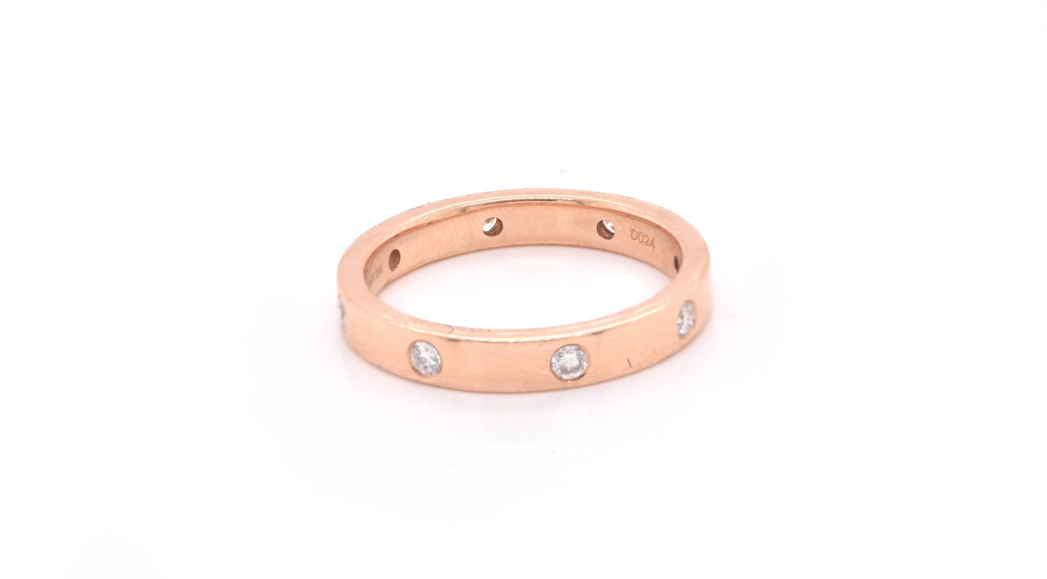 Material: 18k rose gold
Diamonds:  8 round brilliant cut= .20cttw
Color: G
Clarity: VS
Size: 6.5 please allow two additional shipping days for sizing requests)
Dimensions: ring is 3.16mm wide
Weight: 4.09 grams

