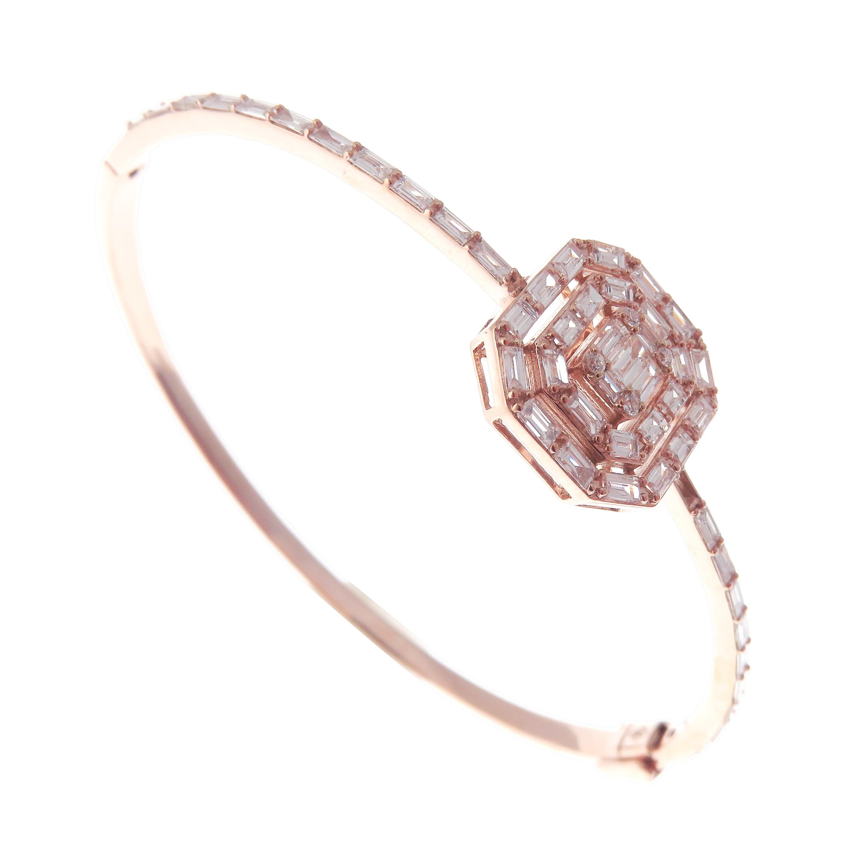 This delicate square baguette bangle is crafted in 18-karat rose gold, weighing approximately 1.62 total carats of V-Quality white diamond. Side clasp closure.  

Fits wrists up to 6.75