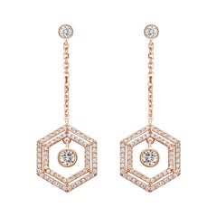 Boucles d'oreilles en or rose 18 carats avec double halo de diamants