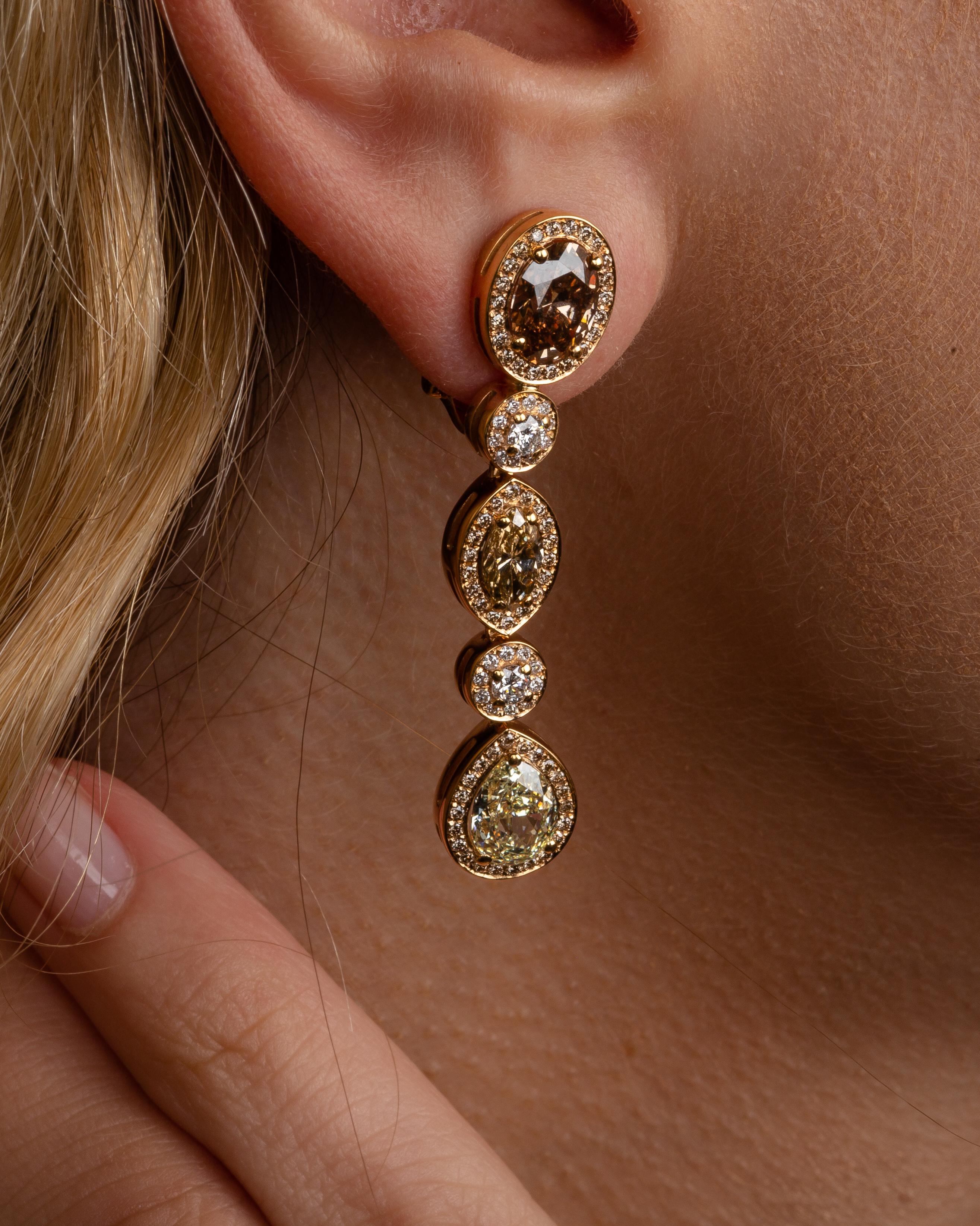 This 18K rose gold classy drop earrings are from our Divine Collection. It is a perfect combination of a 2  oval shape brown diamond in total of 2.05 Carat, 2 pear shape yellow diamond in total of 2.03 Carat, 2 marquise shape brown diamonds in total