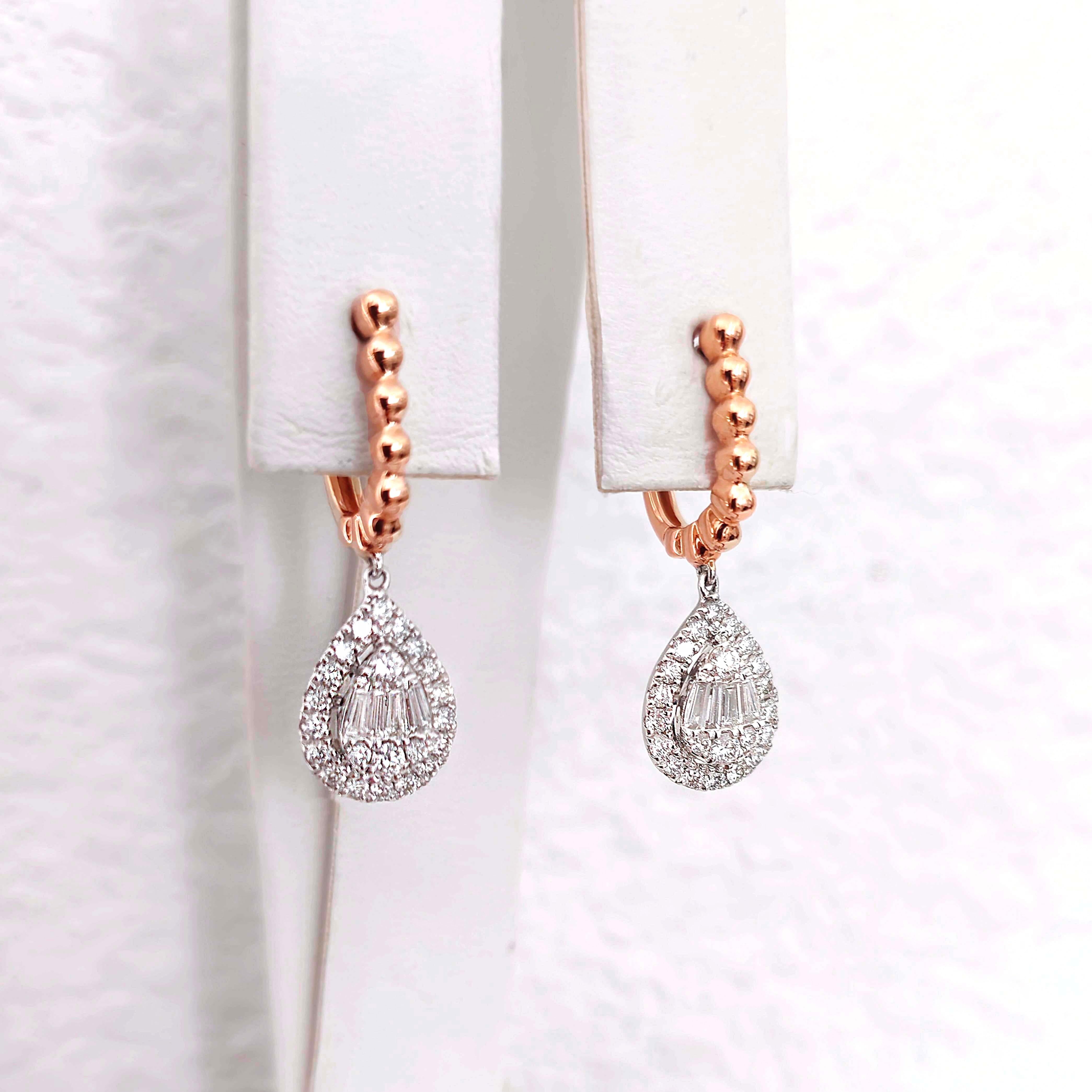 Produced by award winning Italian designer Stefano Vitolo. Stefano creates custom artisanal one of a kind jewelry with excellent gemstones in a truly old world Italian craftmanship.

This handcrafted Earrings has 0.56 total carat weight of F/G color