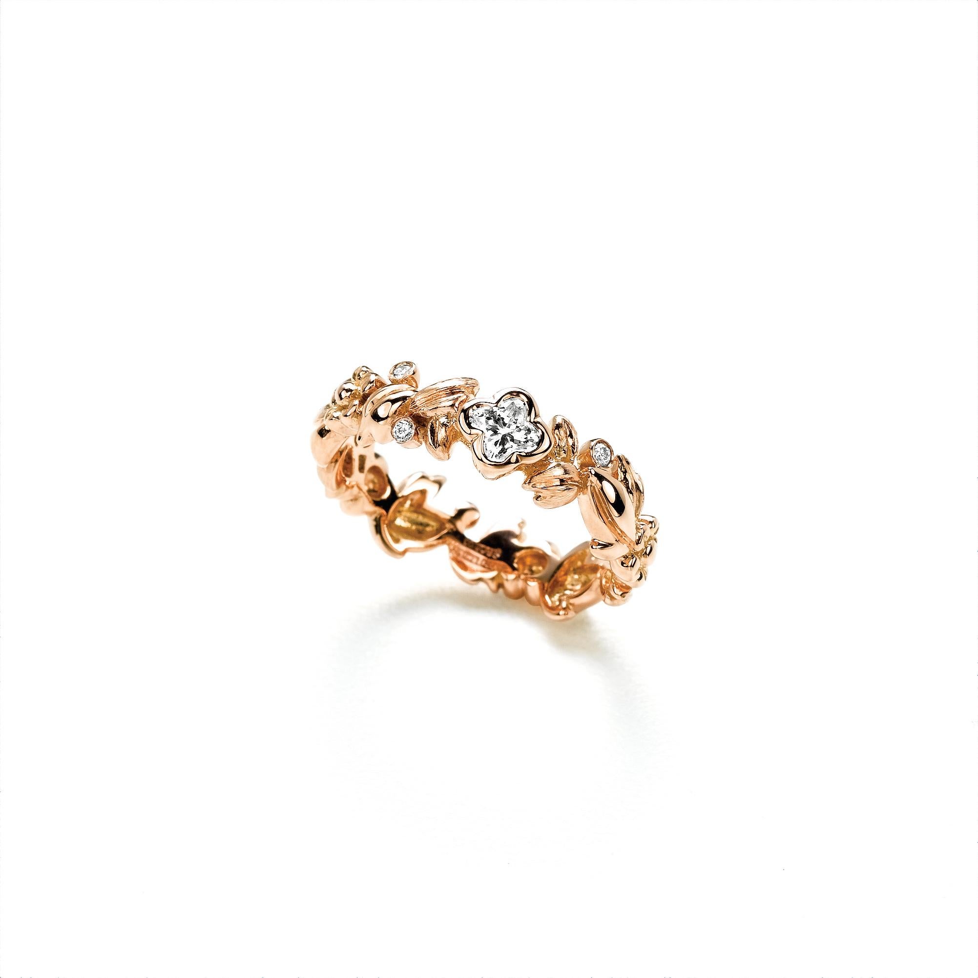 18 Karat Rose Gold  Diamond Flower leaf ring 0.28 Carat Total . .1 LILY CUT ® flower shape diamond H color VS SI clarity  0.25cts . Additional 0.03ct round diamond accent . Available in  Finger sizes 5,6,7 .

