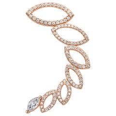 Boucles d
oreilles manchette en or rose 18 carats avec diamants